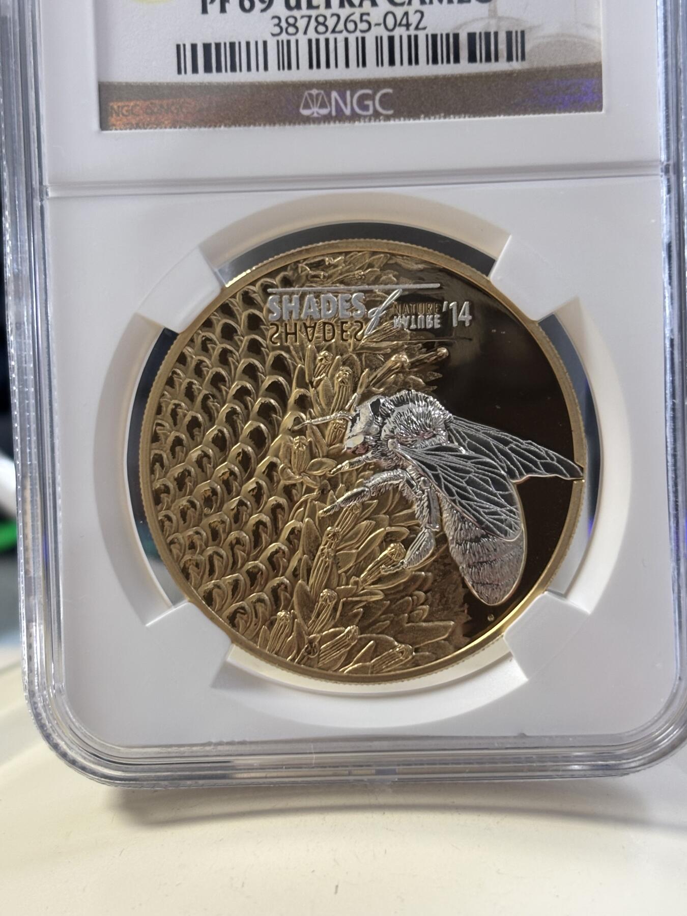 第182期拍卖 库克2014年系列龙头自然之影蜜蜂激光三维微雕精制镀金纪念银币NGC-PF69，25克，925银