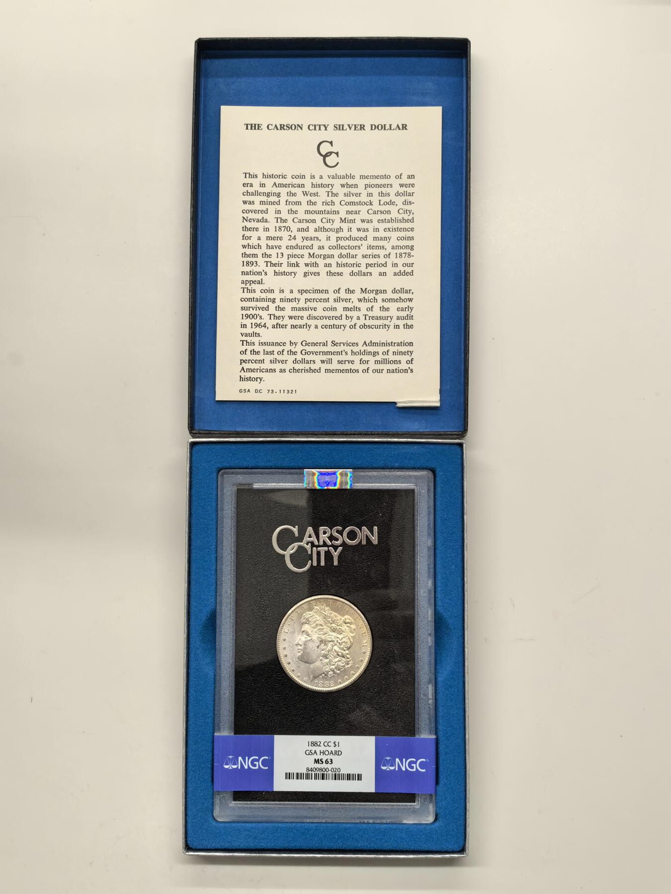 博洋堂藏家专场系列之美国钱币白金之夜专场暨第148期（全场包邮） NGC MS63 美国1882 CC 摩根 卡森厂 GSA大封装 附原盒及证书 人像面覆盖金黄色包浆 高分难得 十字转光
