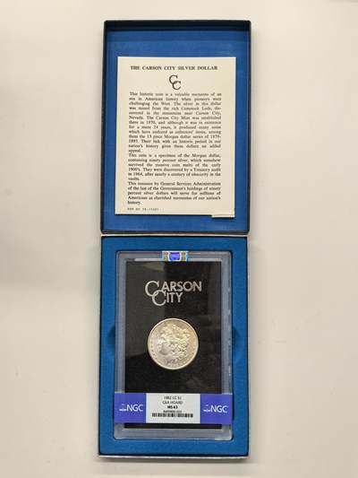 博洋堂藏家专场系列之美国钱币白金之夜专场暨第148期（全场包邮） - NGC MS63 美国1882 CC 摩根 卡森厂 GSA大封装 附原盒及证书 人像面覆盖金黄色包浆 高分难得 十字转光