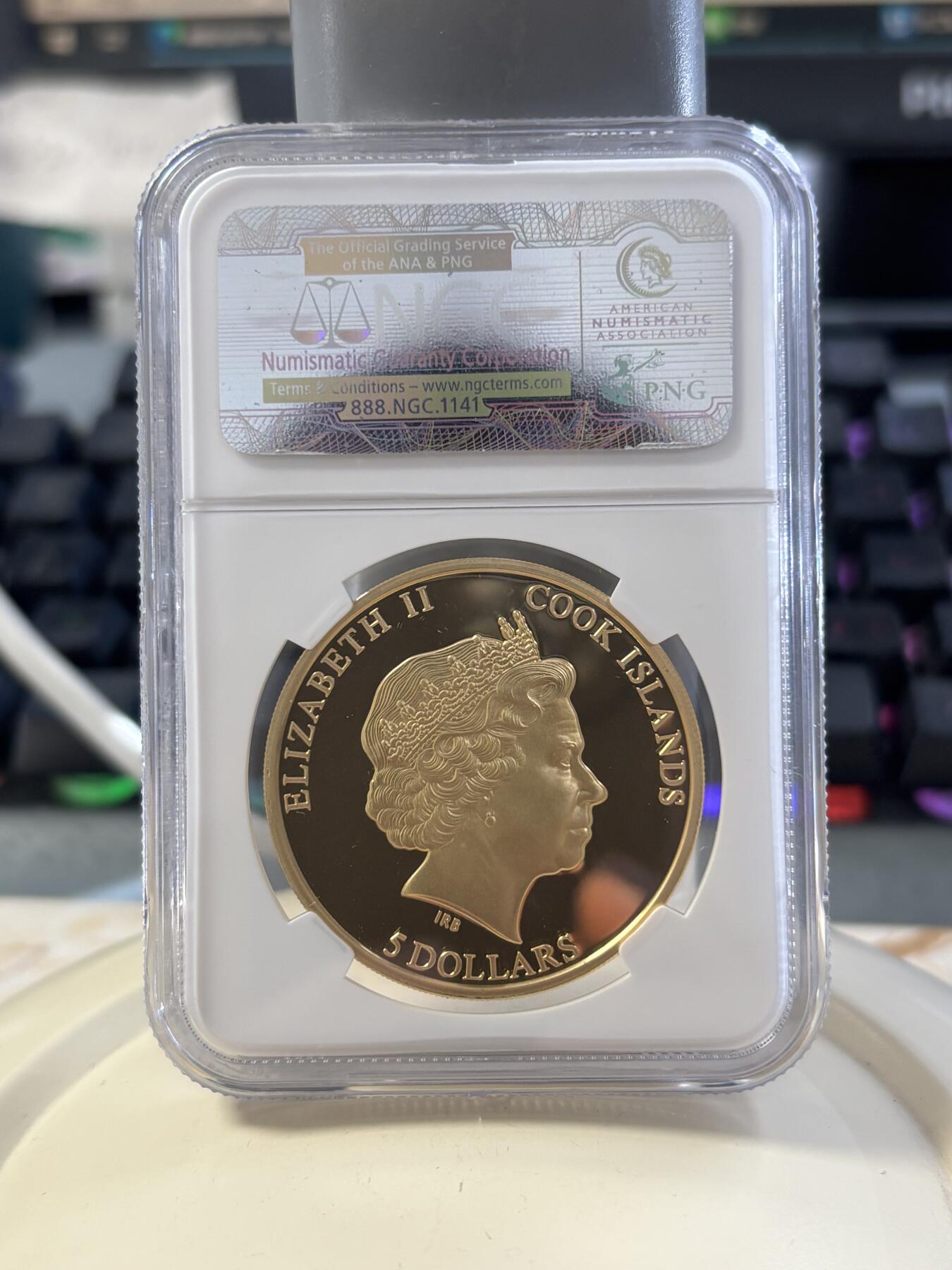 第182期拍卖 库克2014年系列龙头自然之影蜜蜂激光三维微雕精制镀金纪念银币NGC-PF69，25克，925银