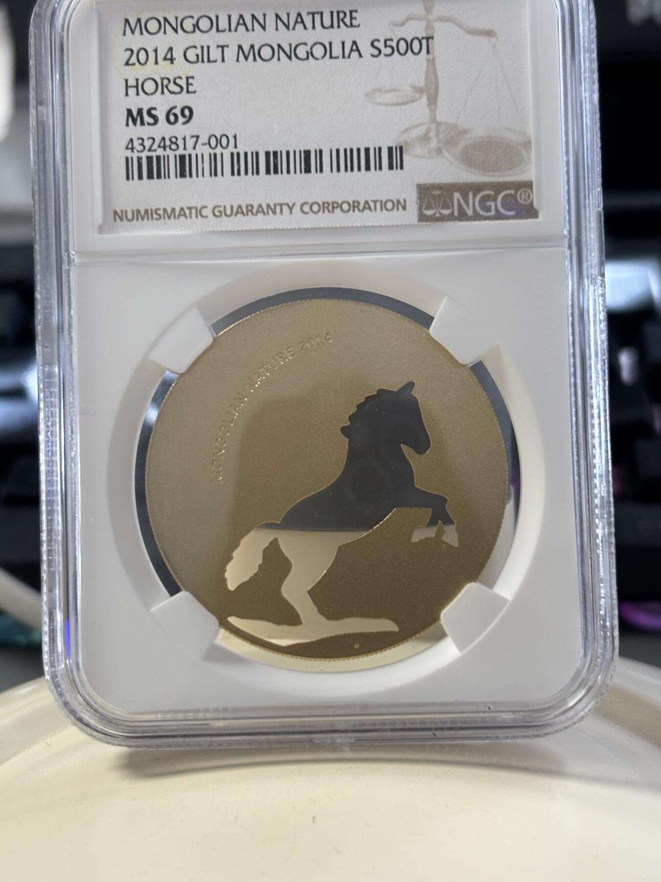 第182期拍卖 蒙古2014年自然动物系列骏马镂空镀金银币NGC-MS69，1/2盎司，925银镀金