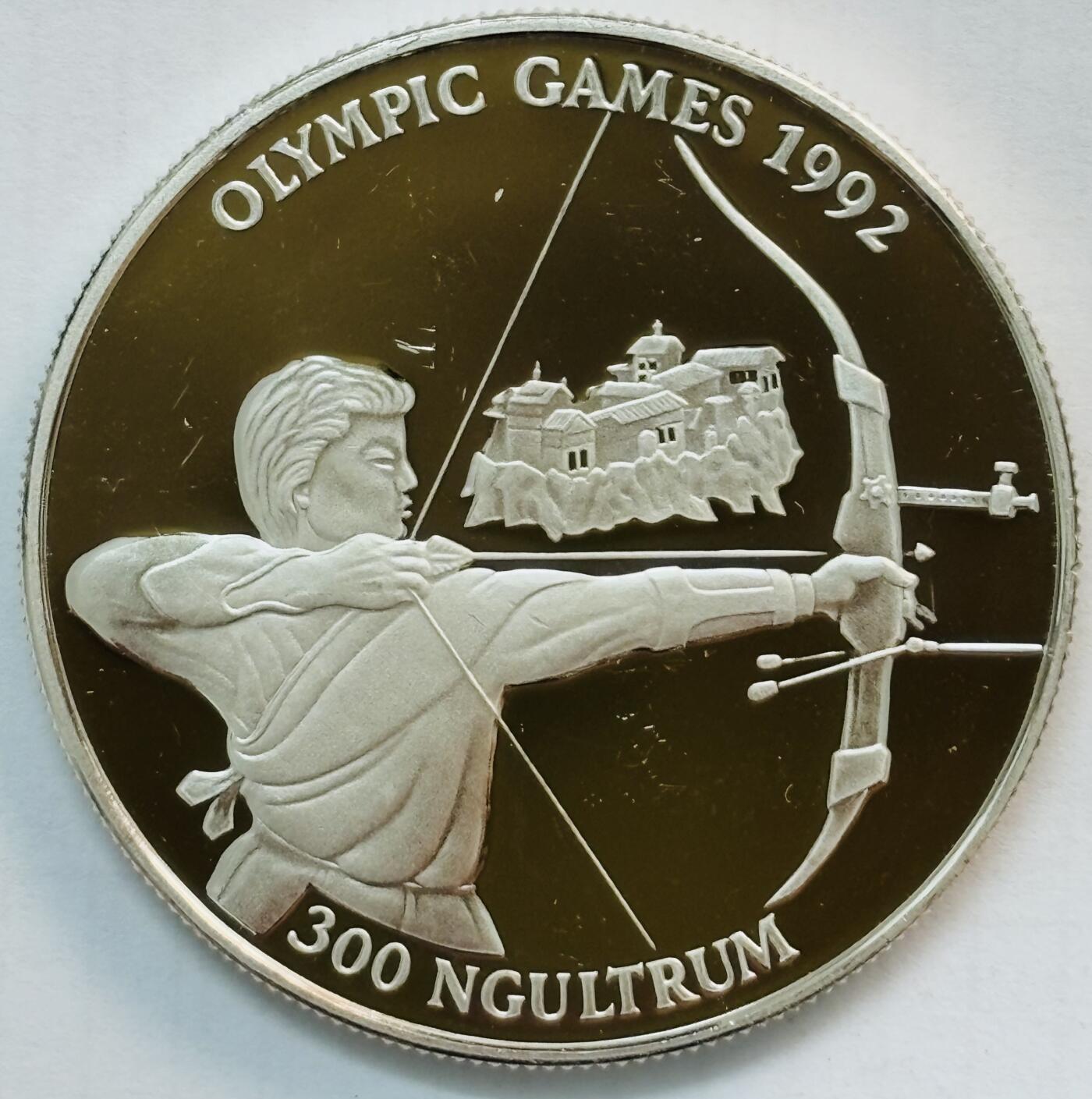 文馨钱币收藏第 282 场，【 长期接收代拍品】，加拿大老铜代用币，银币，德三系列场 少见全新 1992 年不丹 300 努尔特鲁姆精制大银币，重 31.47 克，39 毫米，925 高银