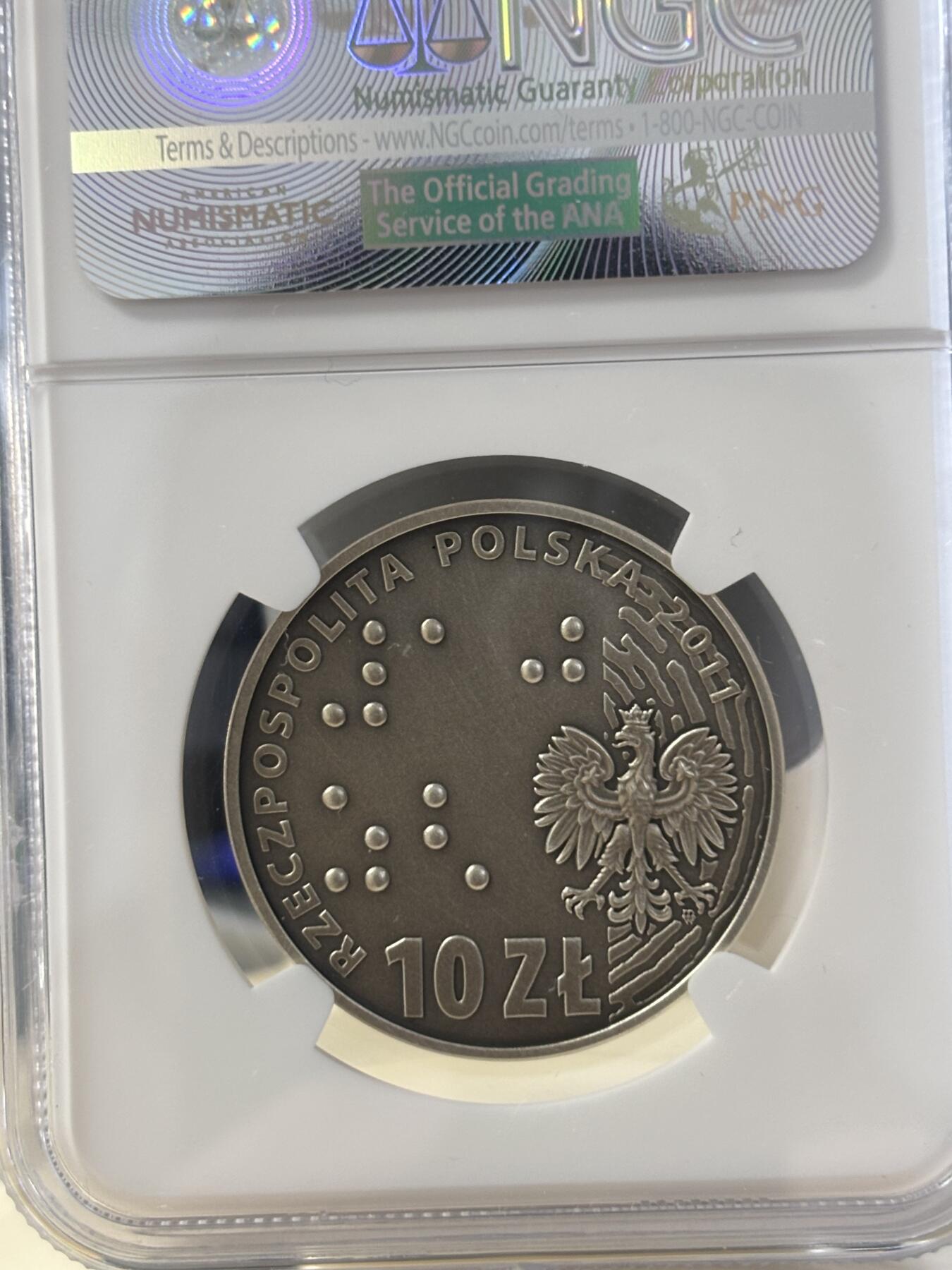 第182期拍卖 获奖币波兰2011年盲人保护协会成立100周年纪念银币NGC-PF69,14.14克，2013年克劳斯最富激情币