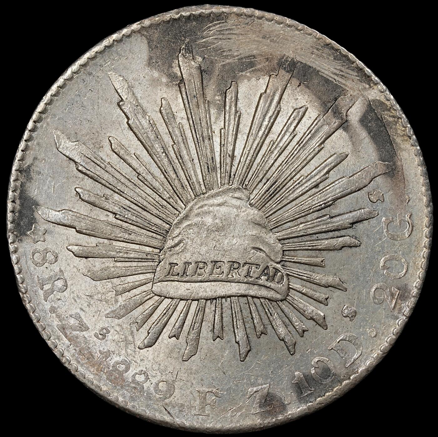 修遠堂世界钱币第九十四期 1889年墨西哥鹰洋 未流通转光 正面12点-2点方向有人为划痕，背面3点方向有一小戳记