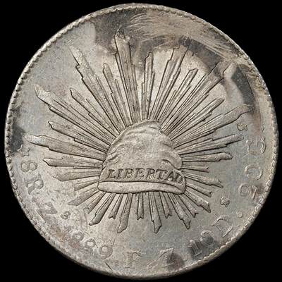 修遠堂世界钱币第九十四期 - 1889年墨西哥鹰洋 未流通转光 正面12点-2点方向有人为划痕，背面3点方向有一小戳记