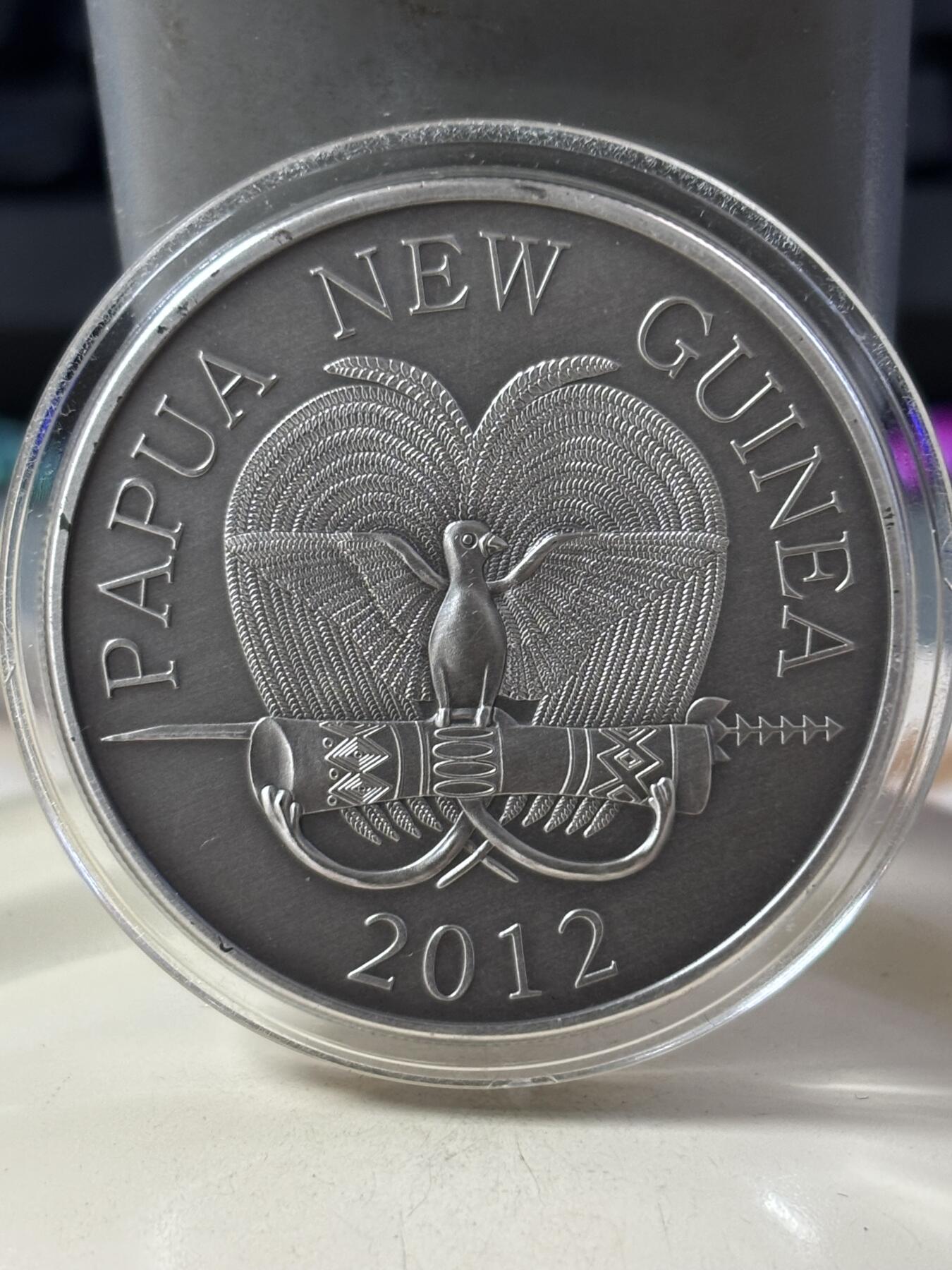 第182期拍卖 巴布亚新几内亚2012年动物针鼹食蚁兽镶黑钻石银币，999银，发行1000枚