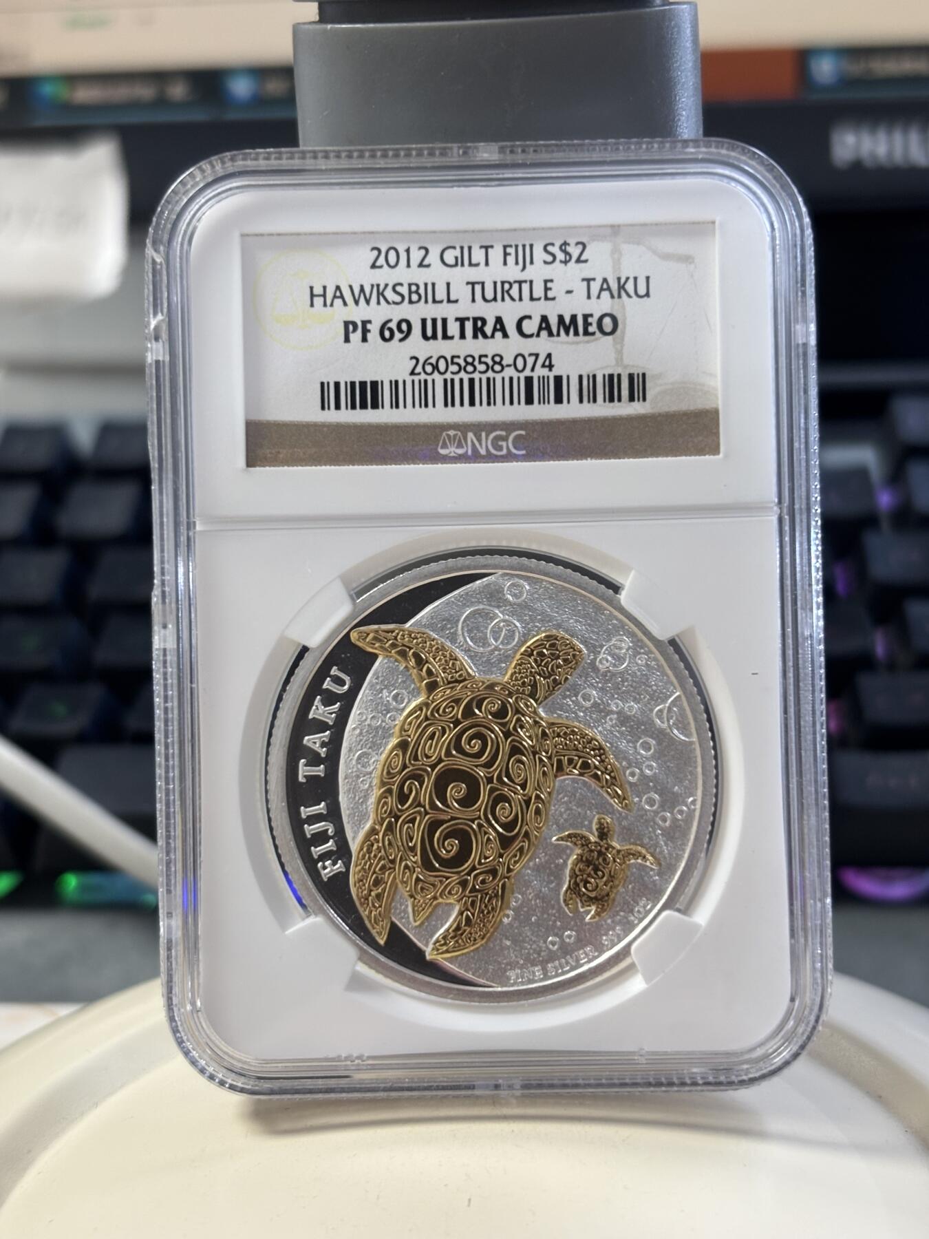 第182期拍卖 斐济2012年海洋生物玳瑁镀金纪念银币NGC-PF69，1盎司。999银