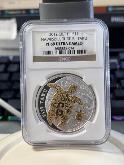 第182期拍卖 - 斐济2012年海洋生物玳瑁镀金纪念银币NGC-PF69，1盎司。999银