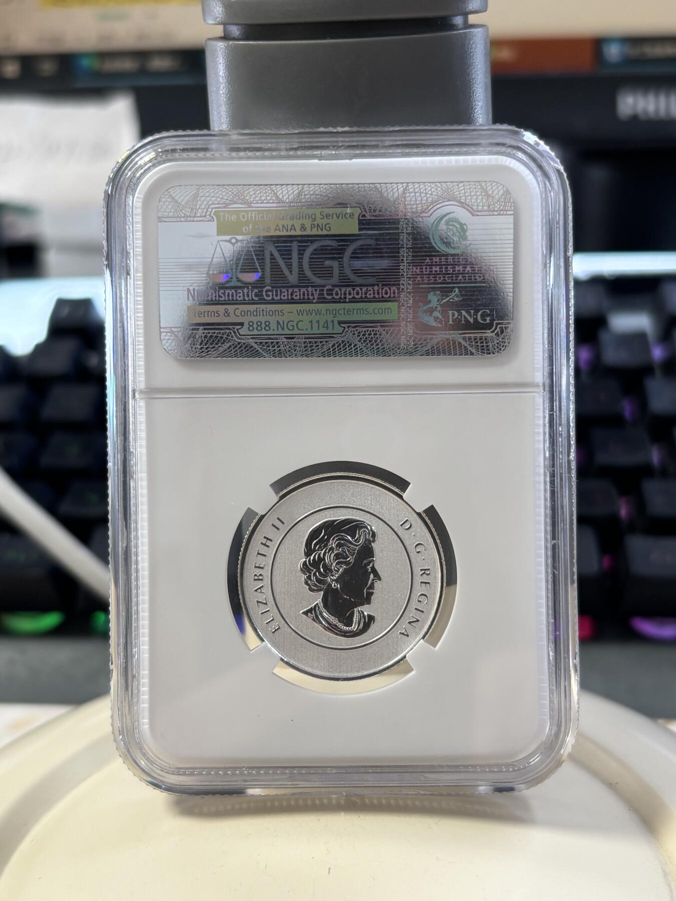 第182期拍卖 加拿大2012年20换20系列圣诞节驯鹿银币NGC-SP70，1/4盎司，9999银