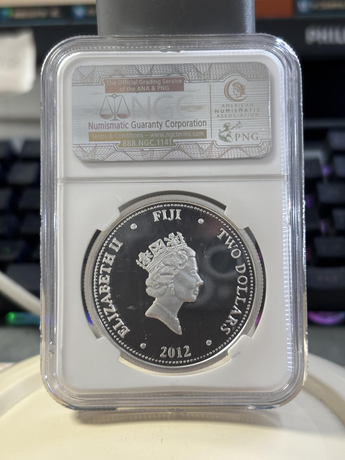 第182期拍卖 斐济2012年海洋生物玳瑁镀金纪念银币NGC-PF69，1盎司。999银