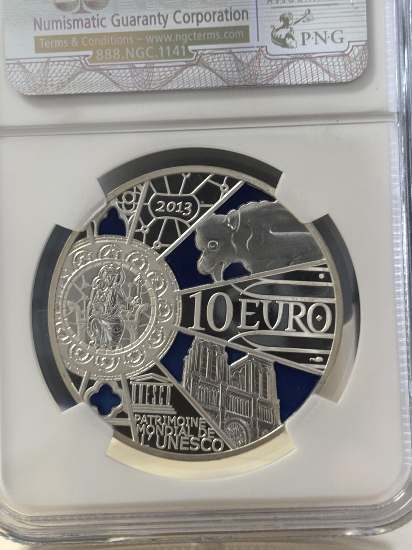 第182期拍卖 法国2013年巴黎圣母院850周年通透彩色精制银币NGC-PF69,21克。900银，发行10000枚