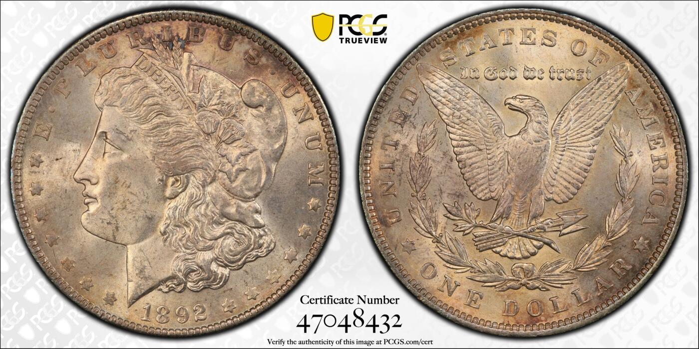 博洋堂藏家专场系列之美国钱币白金之夜专场暨第148期（全场包邮） PCGS MS63 美国1892 摩根 此版是费城铸币厂发行量第二低的年份 仅次于大珍1895“摩根王”由于法案的大量熔毁和糟糕的储存方式 使得此版高分极为难得 麦稀奇首见稀有版别 此枚双面覆盖极美赤褐色包浆 佐以好品相 是极佳的收藏品 背面卡槽有很小的缺