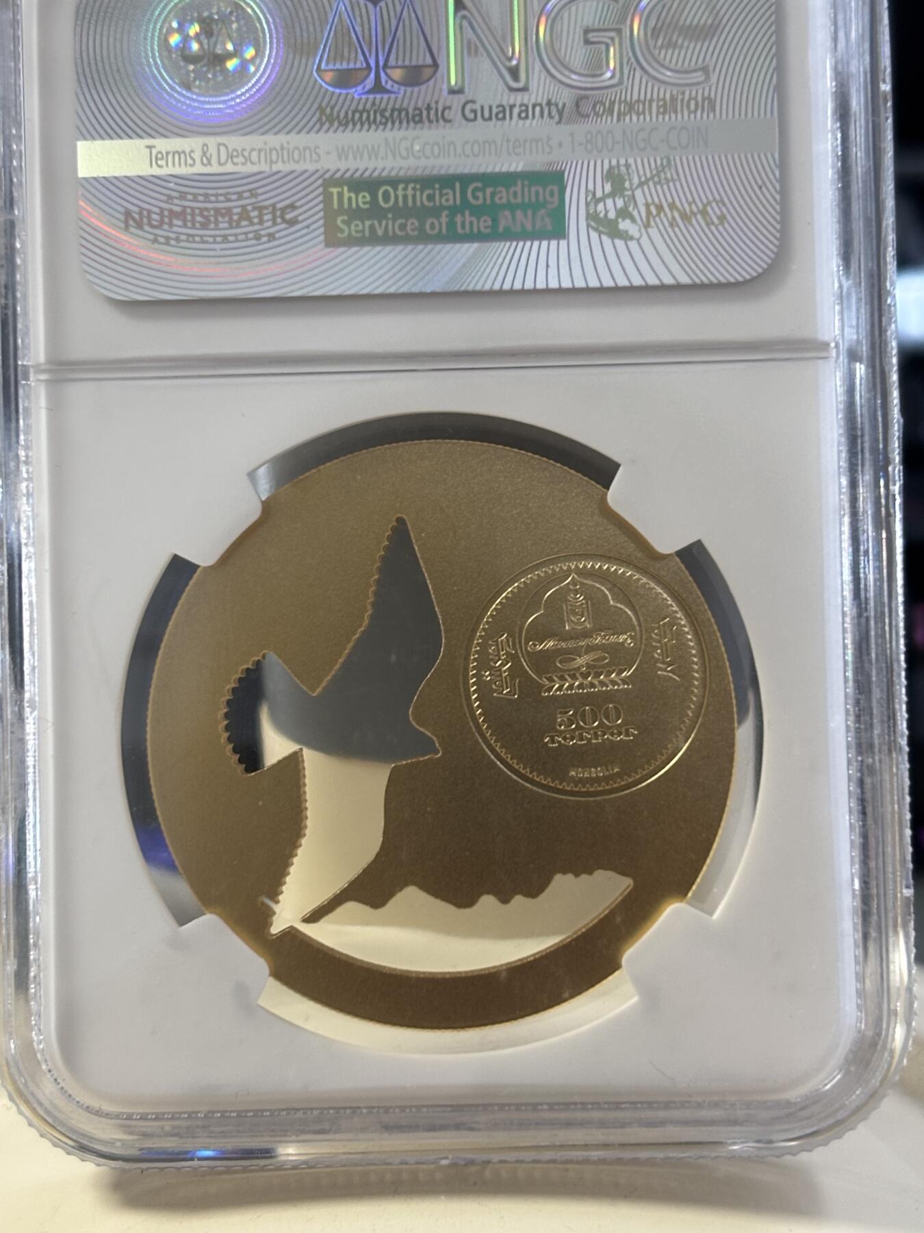 第182期拍卖 蒙古2015年自然动物系列雄鹰镂空镀金银币NGC-MS69，1/2盎司，925银镀金