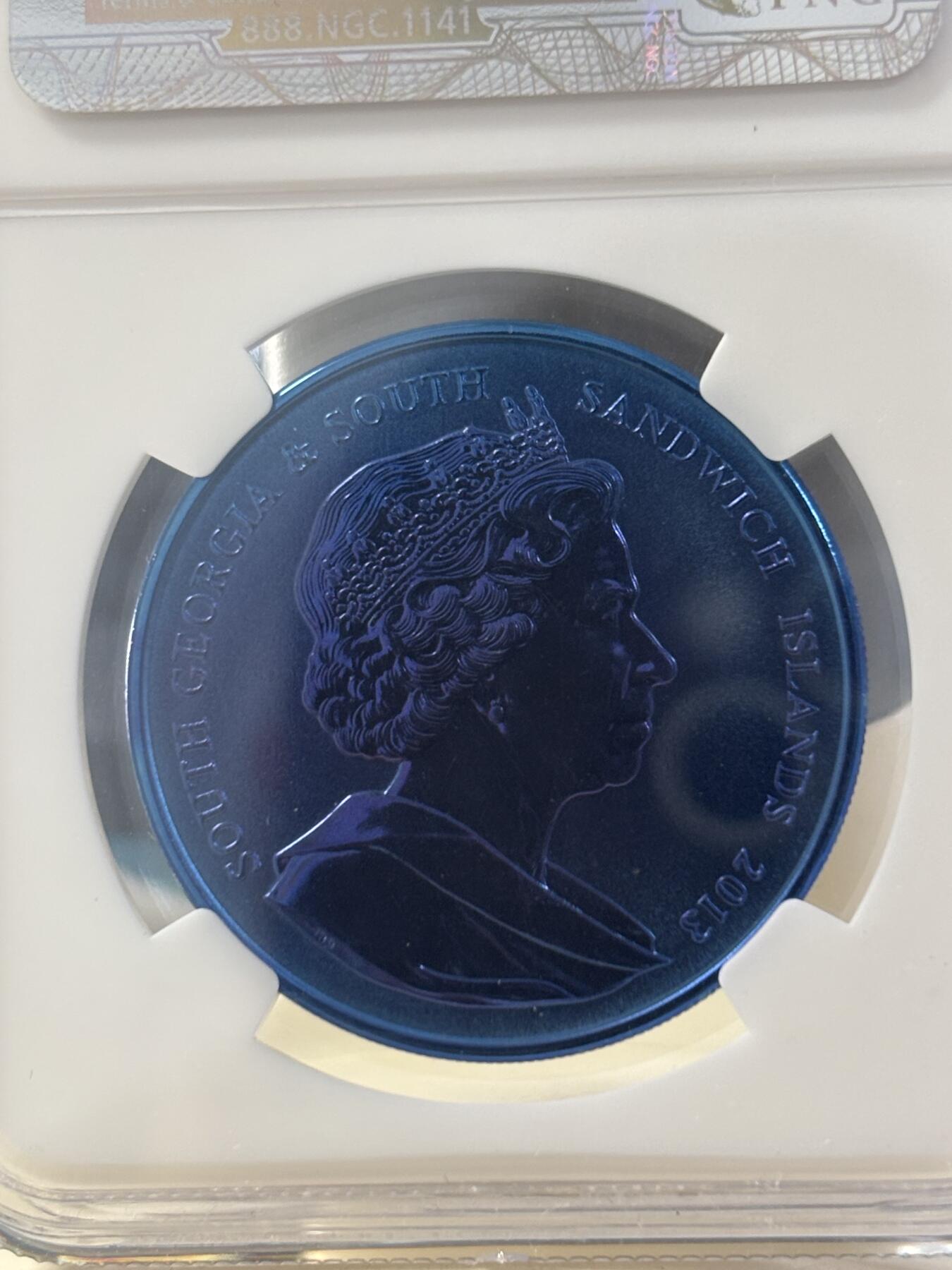 第182期拍卖 英国南乔治亚和南桑德韦奇群岛2013年蓝鲸钛金属纪念币NGC-PF69，10克