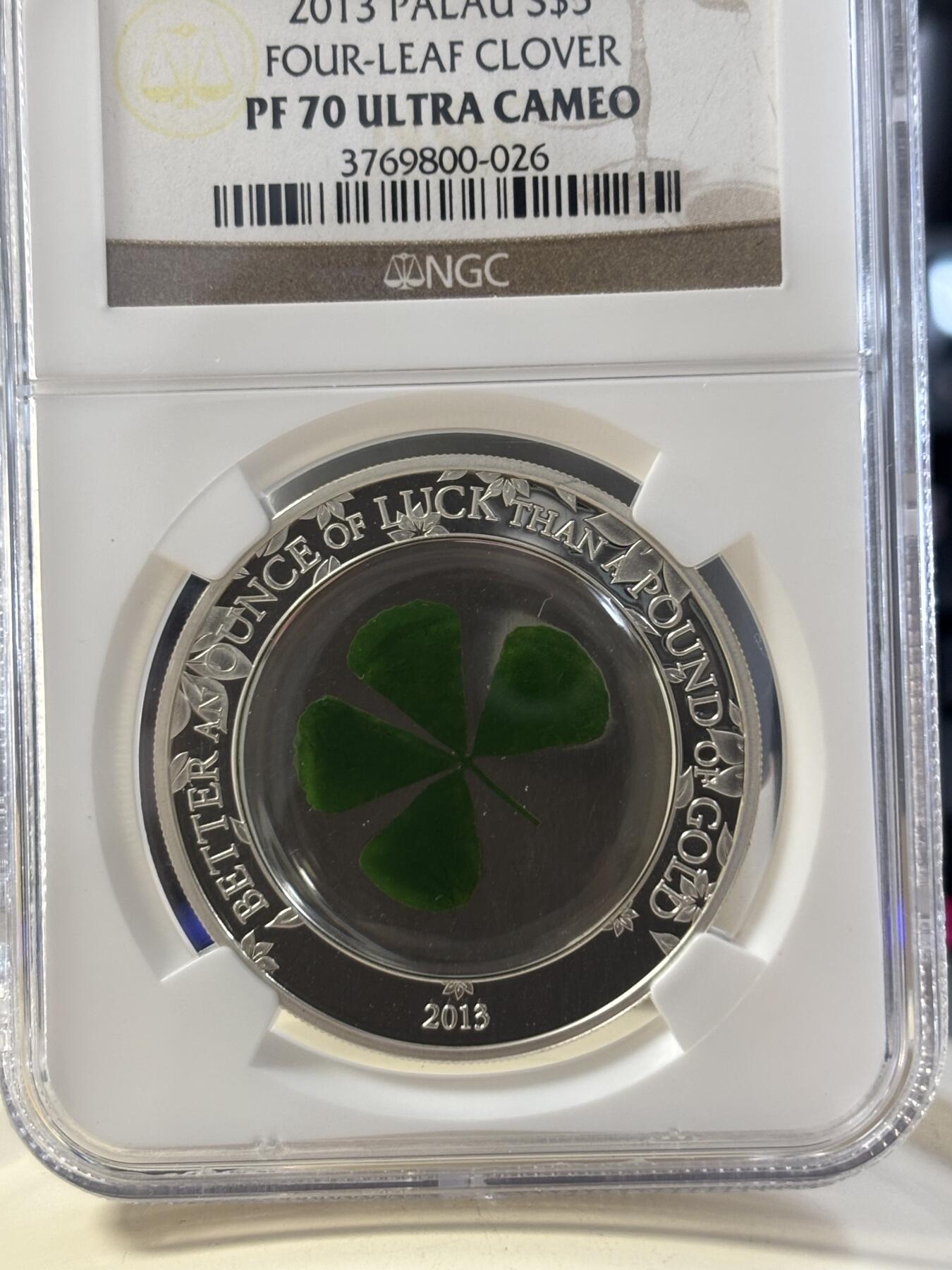 第182期拍卖 帕劳2013年镶嵌实物四叶草精制银币NGC-PF69,1盎司，999银