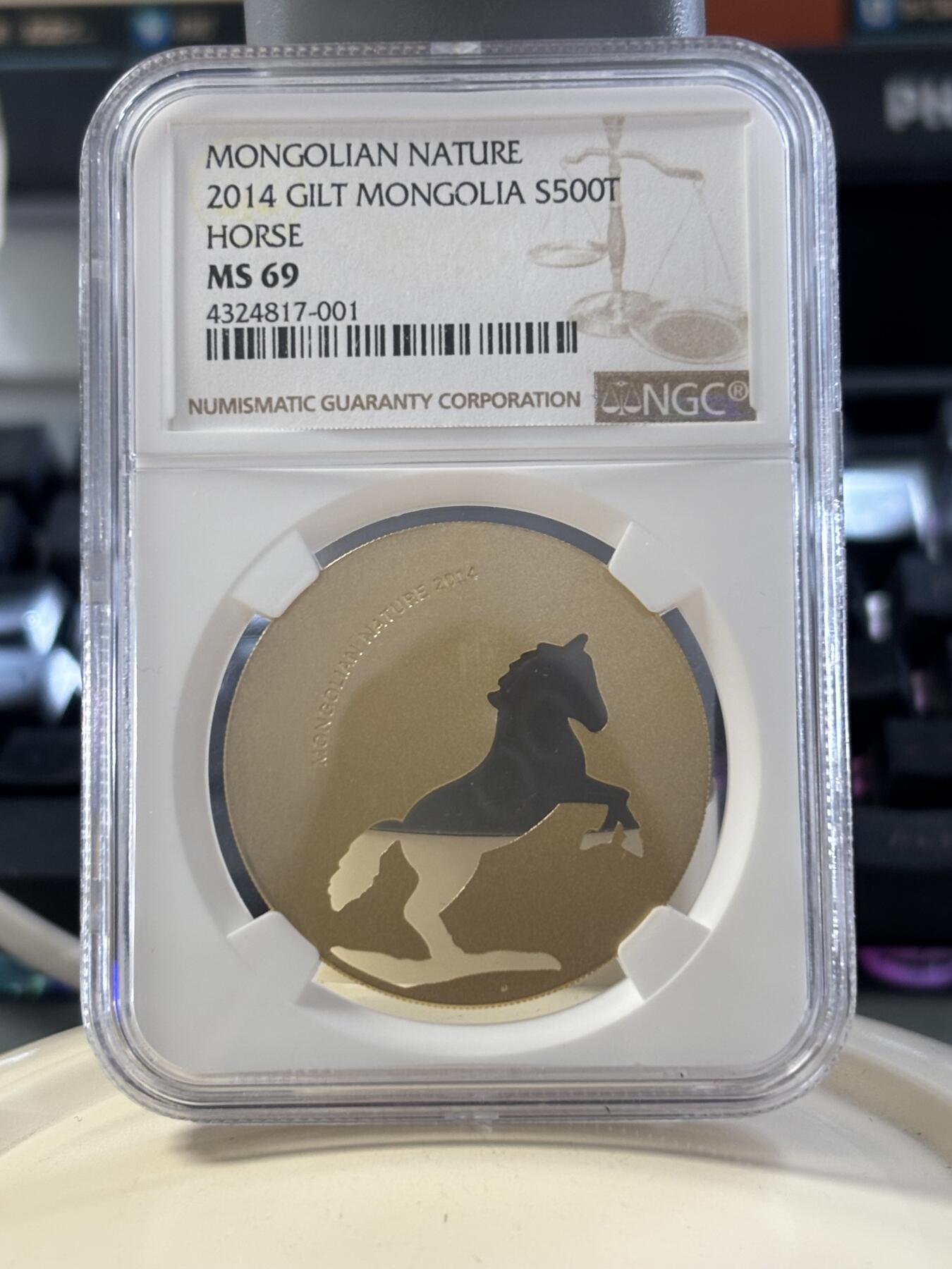 第182期拍卖 蒙古2014年自然动物系列骏马镂空镀金银币NGC-MS69，1/2盎司，925银镀金
