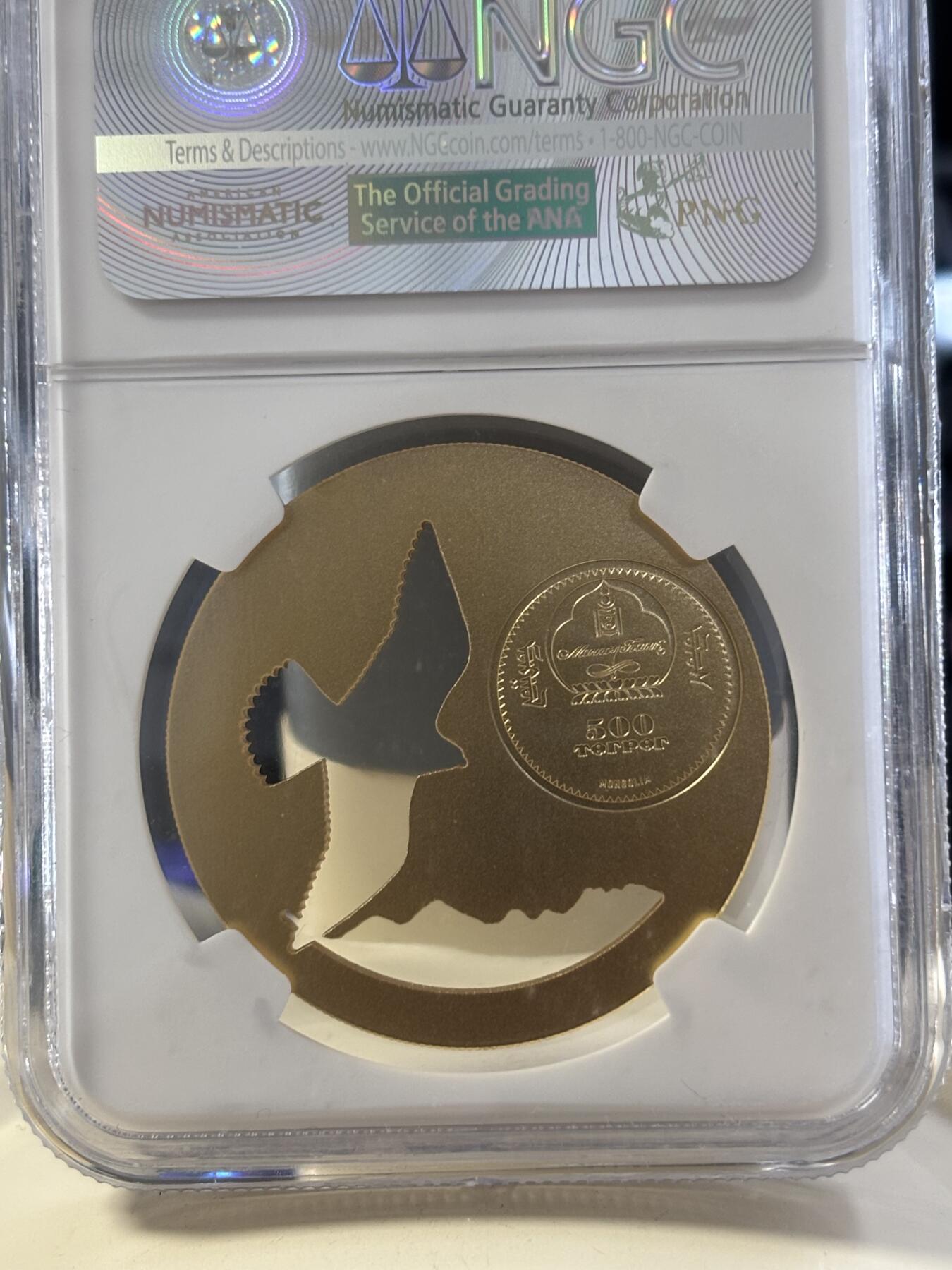 第182期拍卖 蒙古2015年自然动物系列雄鹰镂空镀金银币NGC-MS69，1/2盎司，925银镀金