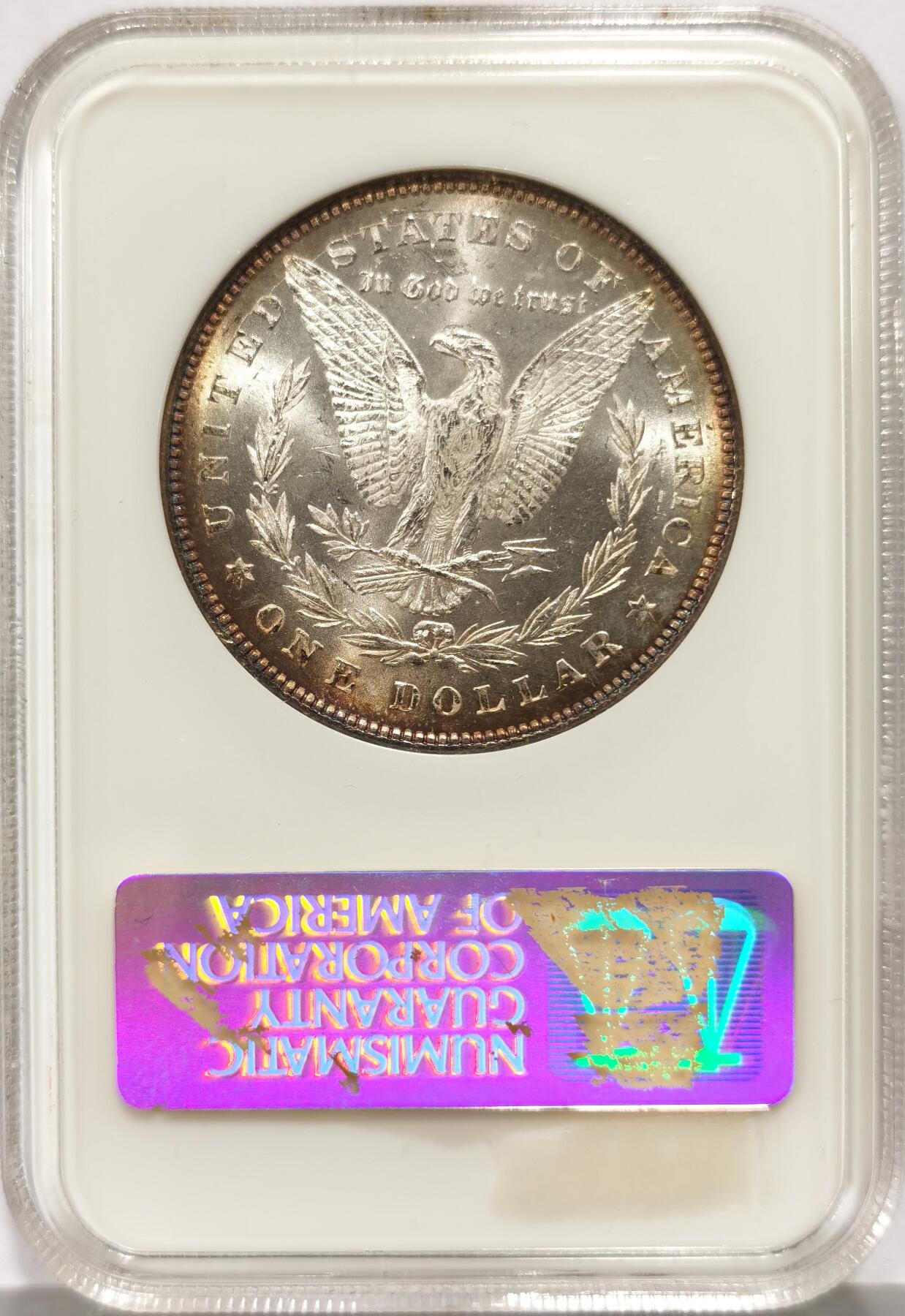 博洋堂世界钱币拍卖第147期（全场包邮） NGC MS63 美国1878年摩根银币，首年摩根，极罕见7羽骑8羽版，数量远少于本就不太多见的8羽版。此枚状态极其出色，环彩+强镜面感，综合看下来完全不逊于过手的64分甚至有机会给PL，NGC非常早期的OGH重评常常有惊喜