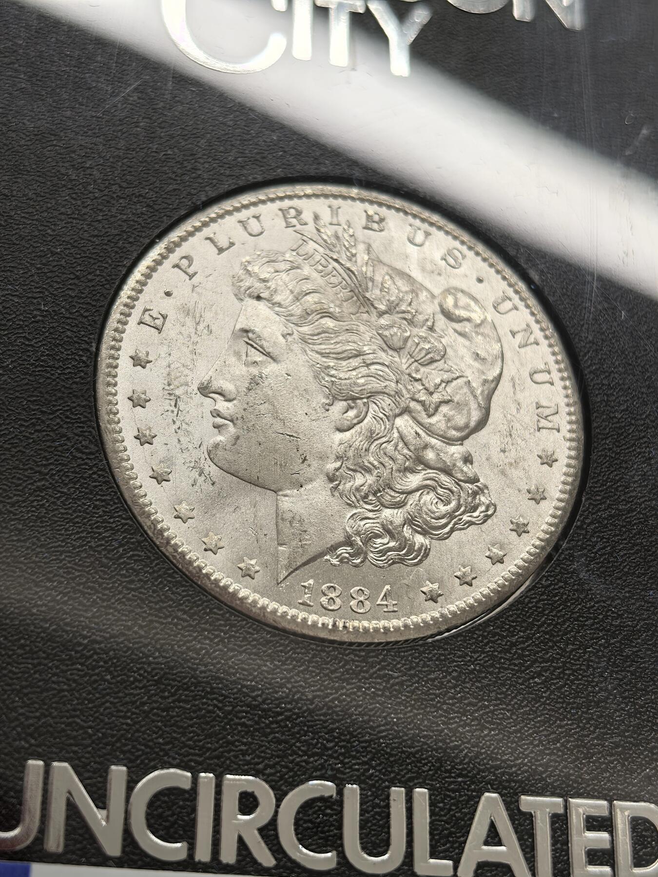 博洋堂藏家专场系列之美国钱币白金之夜专场暨第148期（全场包邮） NGC MS64 美国1884 CC 摩根 卡森厂 GSA大封装 附原盒及证书 高分难得 十字转光