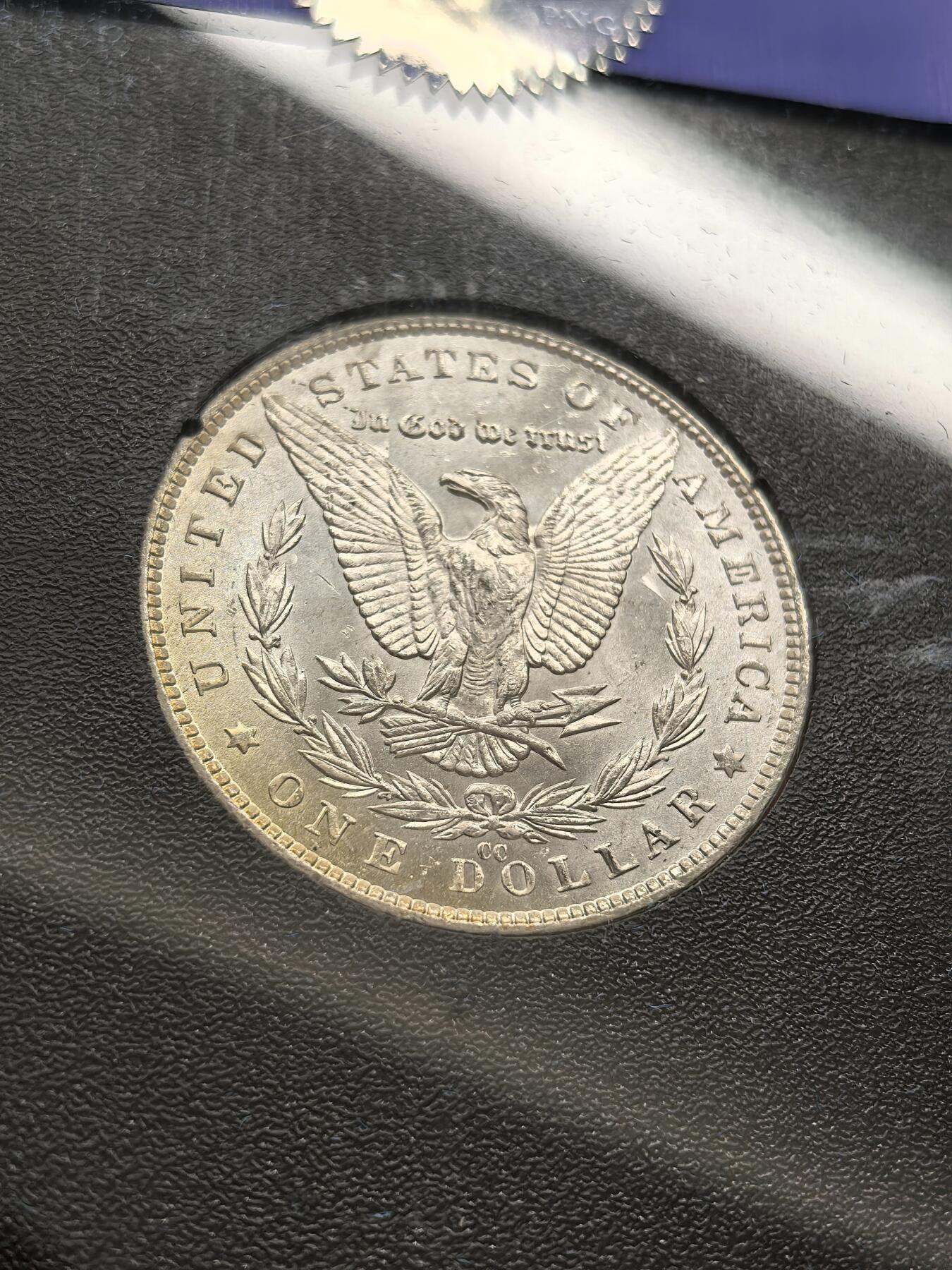 博洋堂藏家专场系列之美国钱币白金之夜专场暨第148期（全场包邮） NGC MS63 美国1882 CC 摩根 卡森厂 GSA大封装 附原盒及证书 鹰面覆盖金黄色包浆 高分难得 十字转光