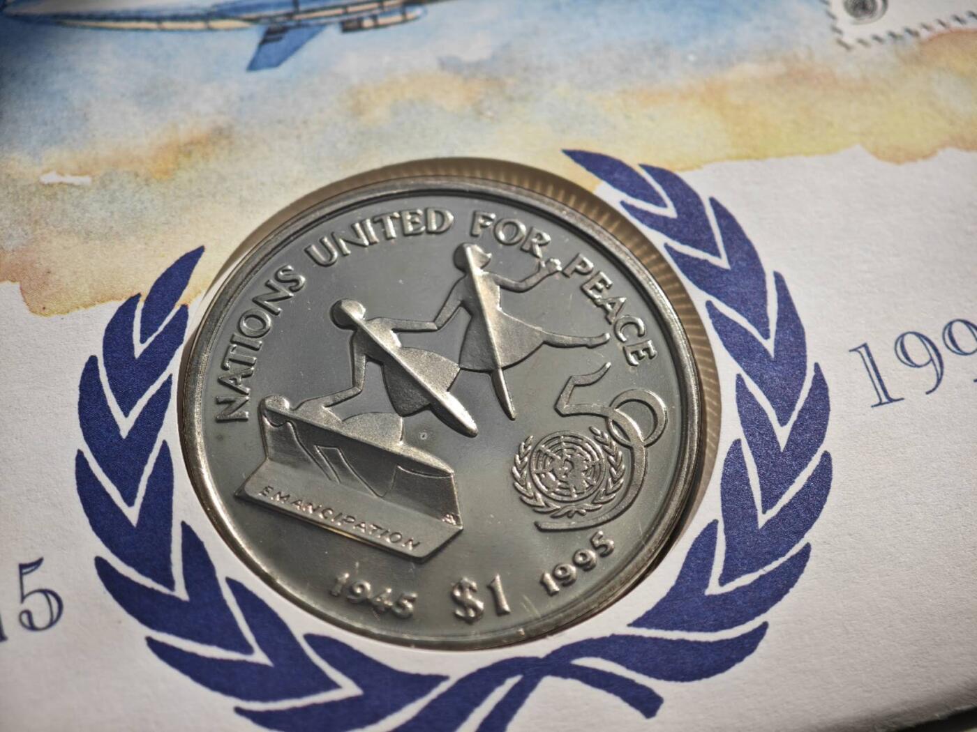 【淘币小摊】限时拍第八百零七拍  克朗币邮币封场  满百包邮可预留两周  周一统一发货  利比里亚1995年联合国50周年1元纪念币邮币封