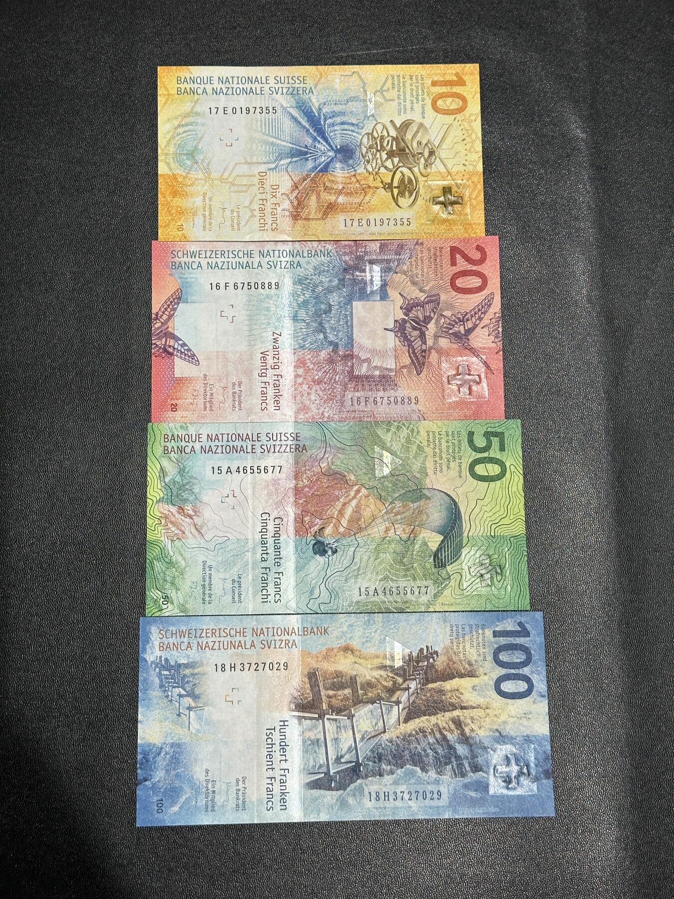 《外钞收藏家》第五百八十七期（精选场）（本平台长期征集拍品、欢迎藏友们联系合作） 瑞士手版10-100法郎 四张一起 全新UNC