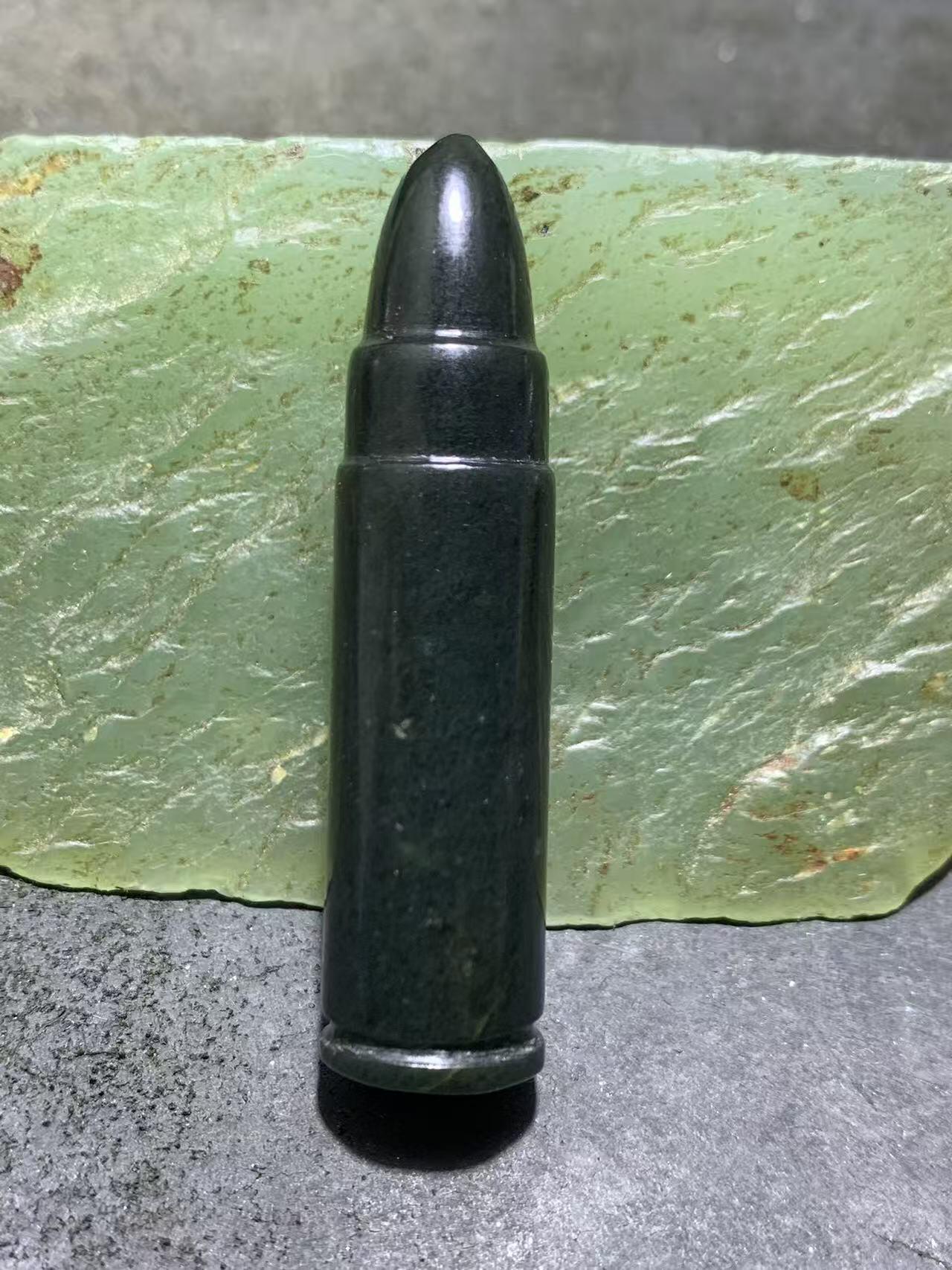 天然新疆和田青玉子 弹通货吊坠1颗，，