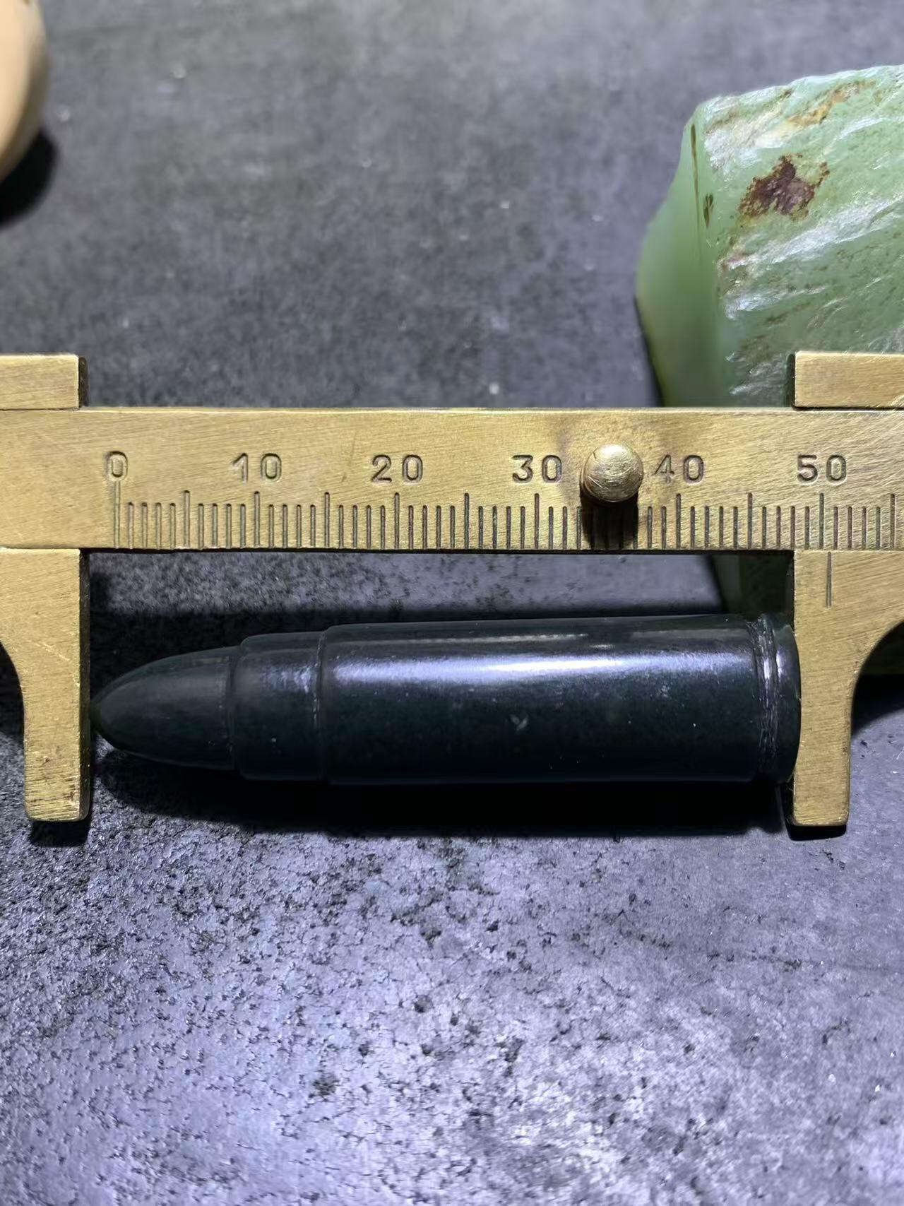 天然新疆和田青玉子 弹通货吊坠1颗，，