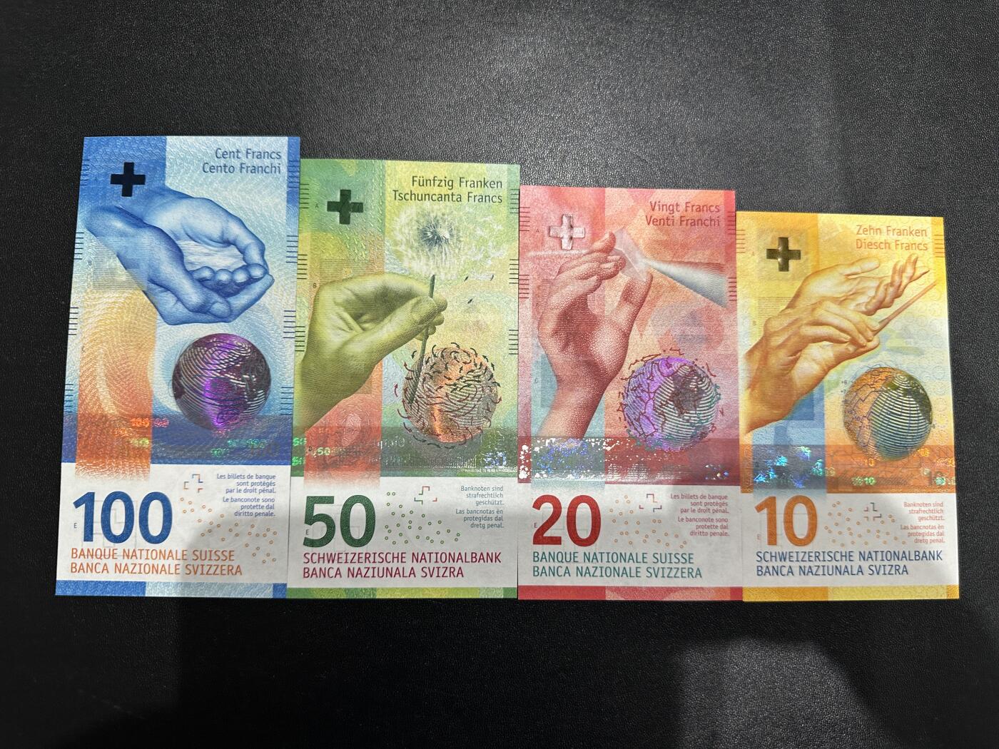 《外钞收藏家》第五百八十七期（精选场）（本平台长期征集拍品、欢迎藏友们联系合作） 瑞士手版10-100法郎 四张一起 全新UNC