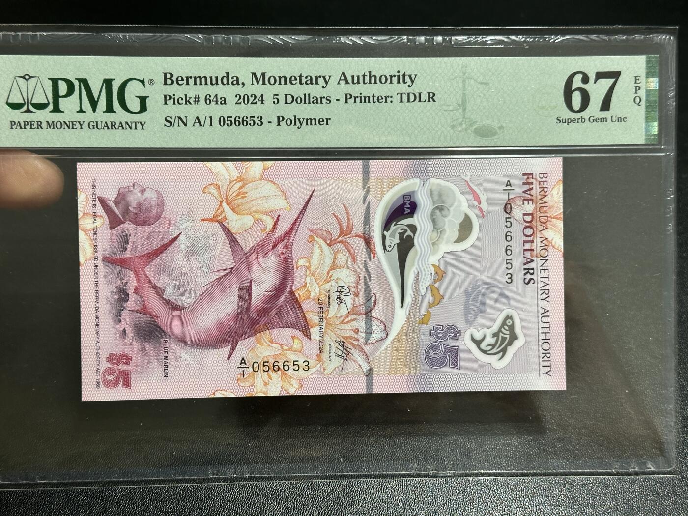 《外钞收藏家》第五百八十七期（精选场）（本平台长期征集拍品、欢迎藏友们联系合作） 2024年百慕大最新版5元 塑料钞 A/1冠 无47 PMG67 获奖钞