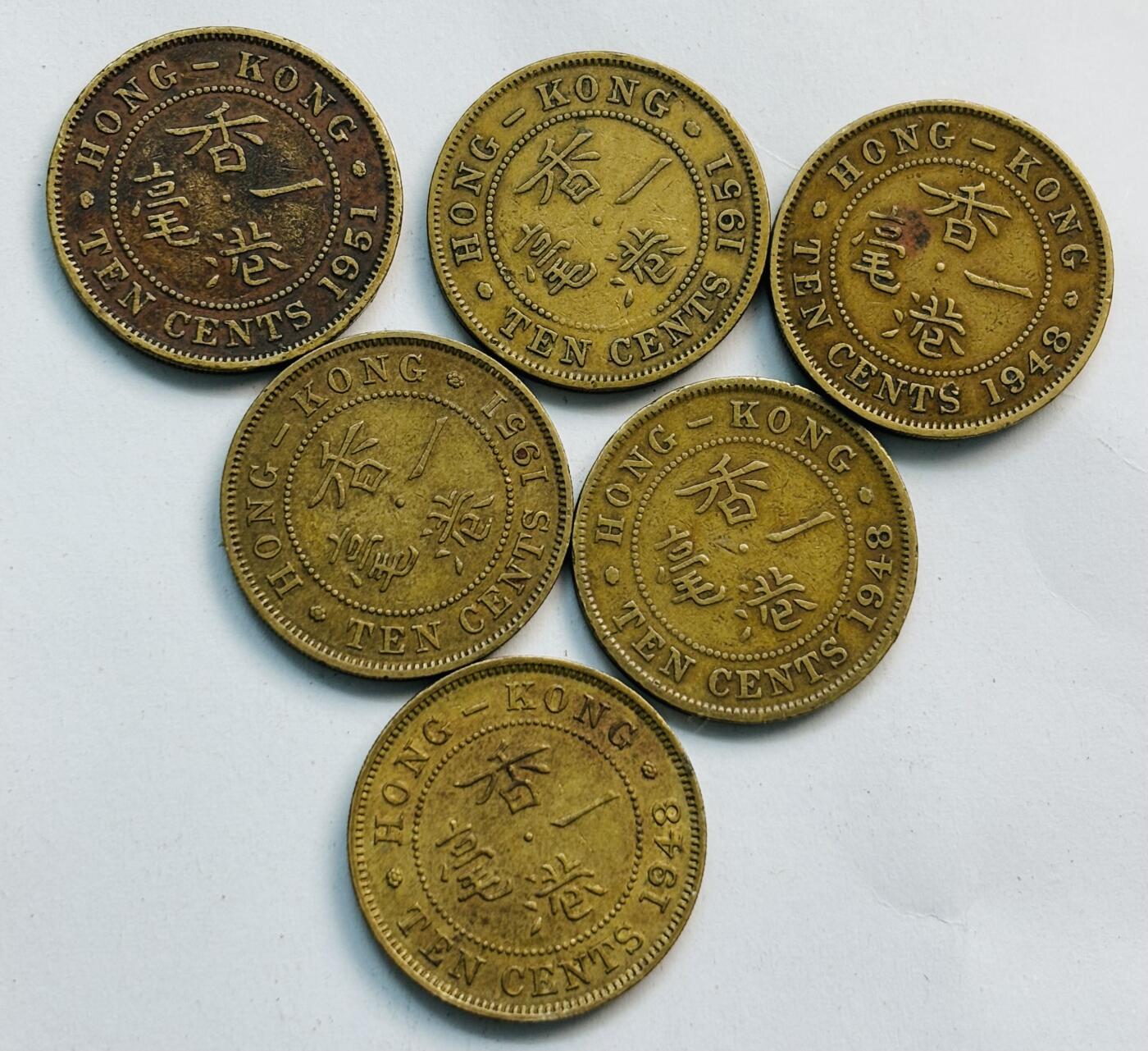 文馨钱币收藏第 282 场，【 长期接收代拍品】，加拿大老铜代用币，银币，德三系列场 少见英属香港乔治六世时期首发年关门年大一毫铜币 6 枚