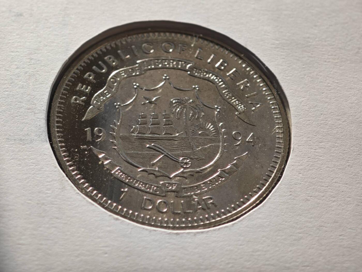 【淘币小摊】限时拍第八百零七拍  克朗币邮币封场  满百包邮可预留两周  周一统一发货   利比里亚1994年赛车锦标赛1元纪念币邮币封