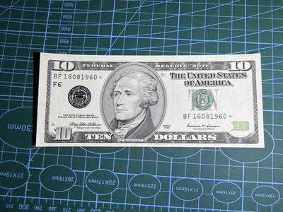 【炜奕收藏】，第五十一期 - 1999年美国10美元，补号，UNC品相，倒置号