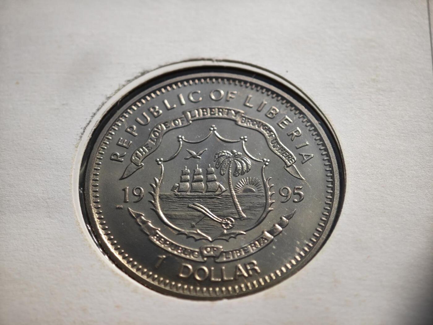 【淘币小摊】限时拍第八百零七拍  克朗币邮币封场  满百包邮可预留两周  周一统一发货  利比里亚1995年联合国50周年1元纪念币邮币封