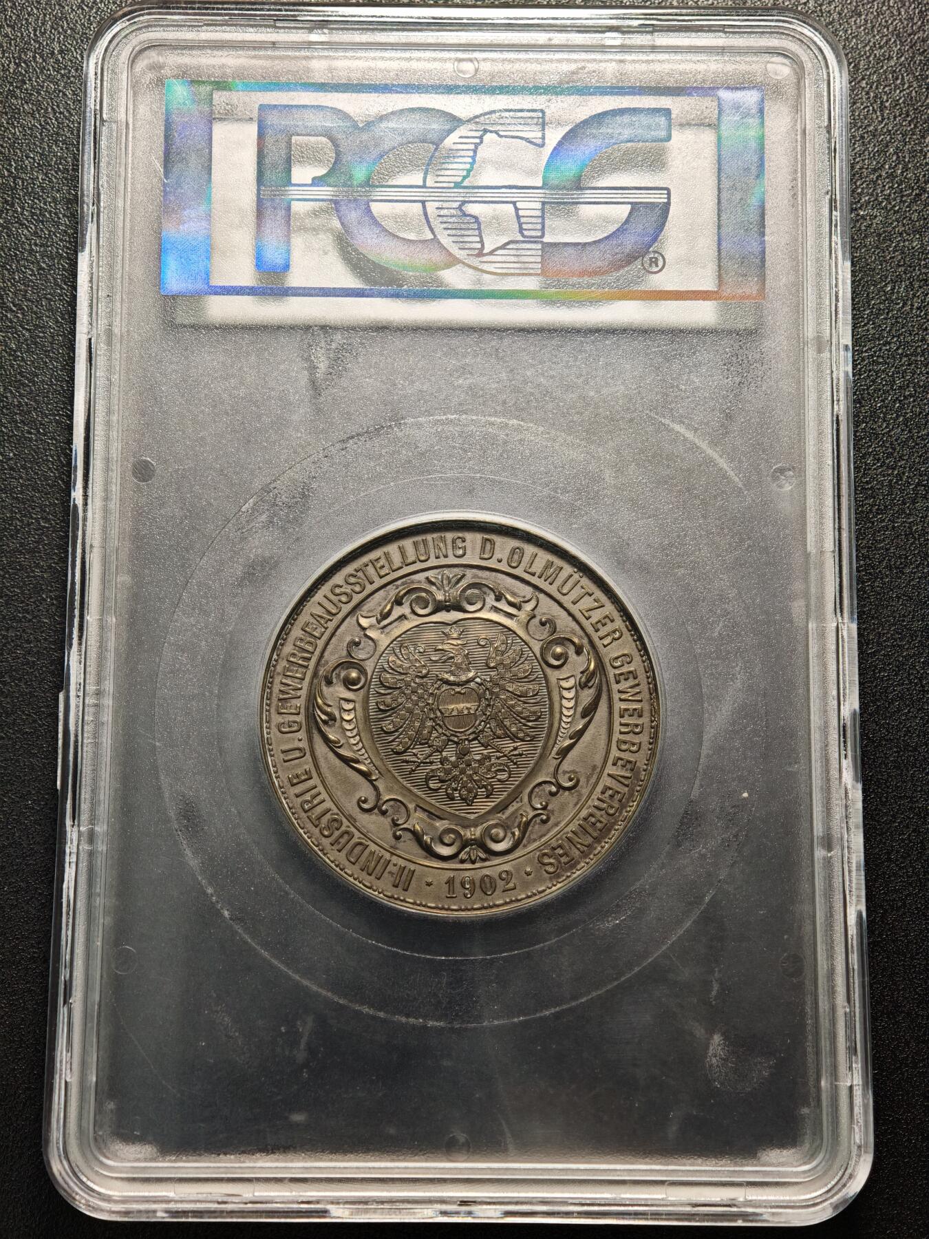 【德藏】世界币章拍卖第154期（拍品征集中~欢迎藏友联系） 1902年 奥地利奥尔穆茨手工业协会第二届工业与商业展览纪念大铜章 50mm PCGS MS63 设计精美细腻