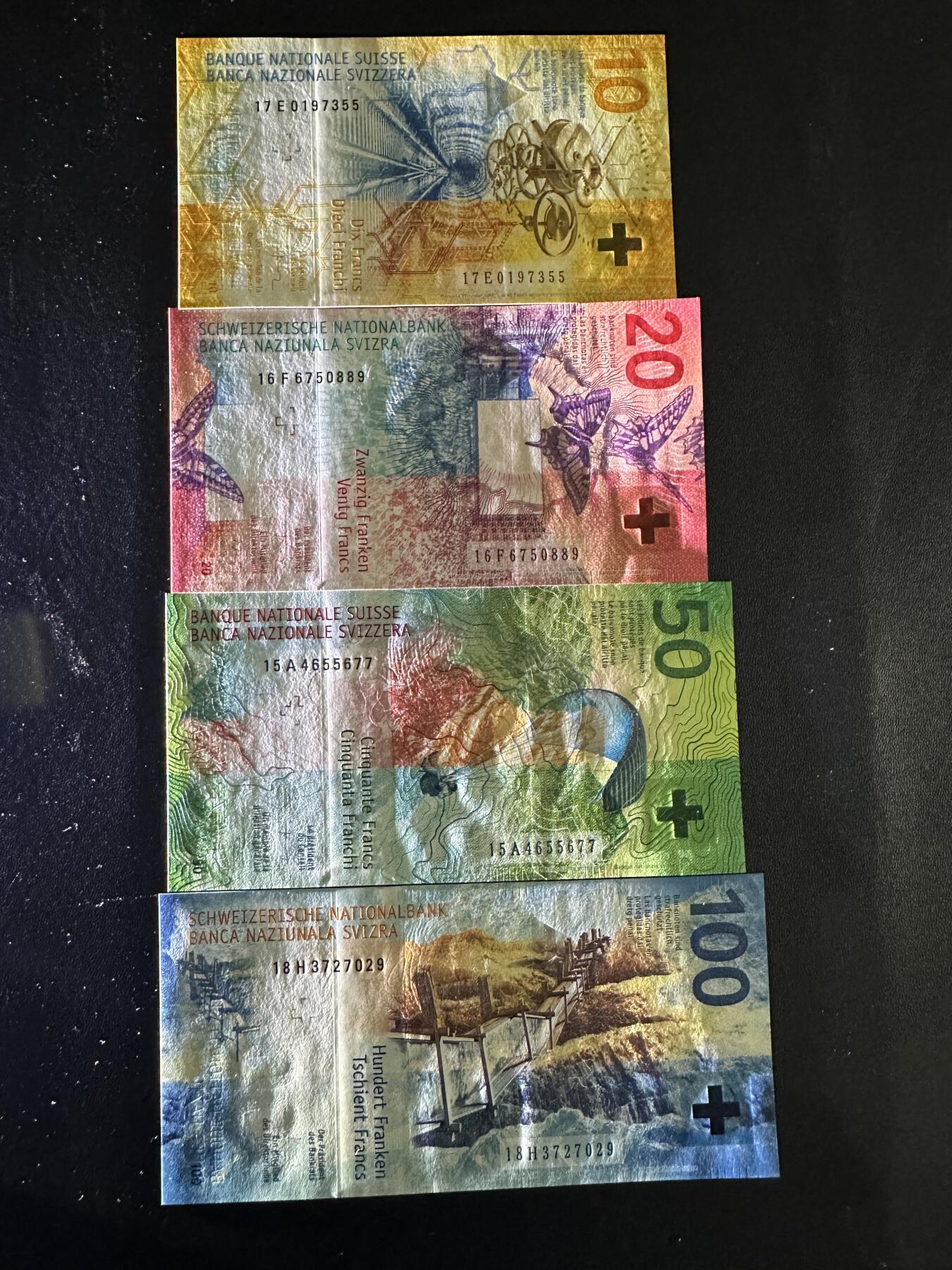 《外钞收藏家》第五百八十七期（精选场）（本平台长期征集拍品、欢迎藏友们联系合作） 瑞士手版10-100法郎 四张一起 全新UNC