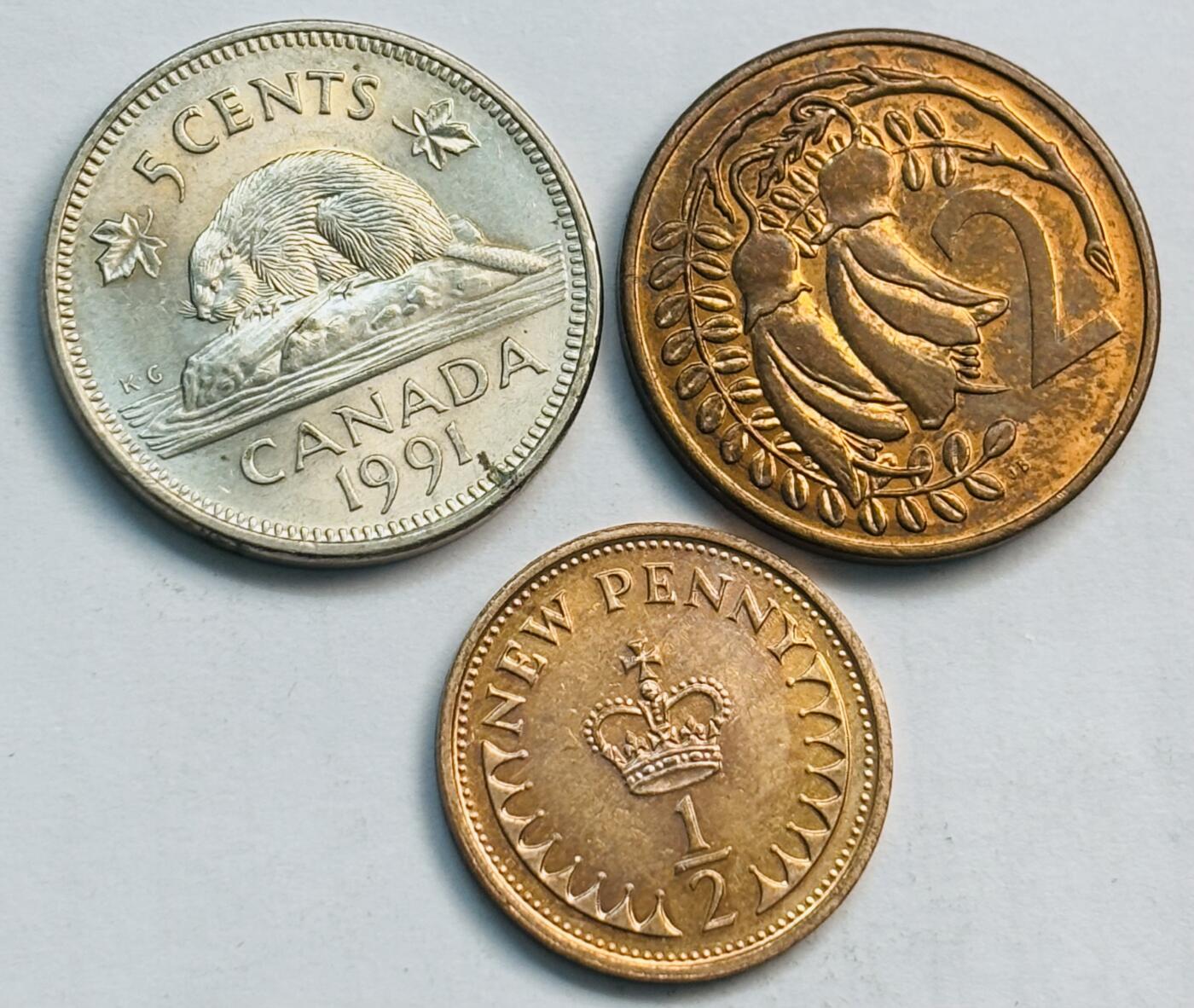 文馨钱币收藏第 282 场，【 长期接收代拍品】，加拿大老铜代用币，银币，德三系列场 原光品相英系 3 枚