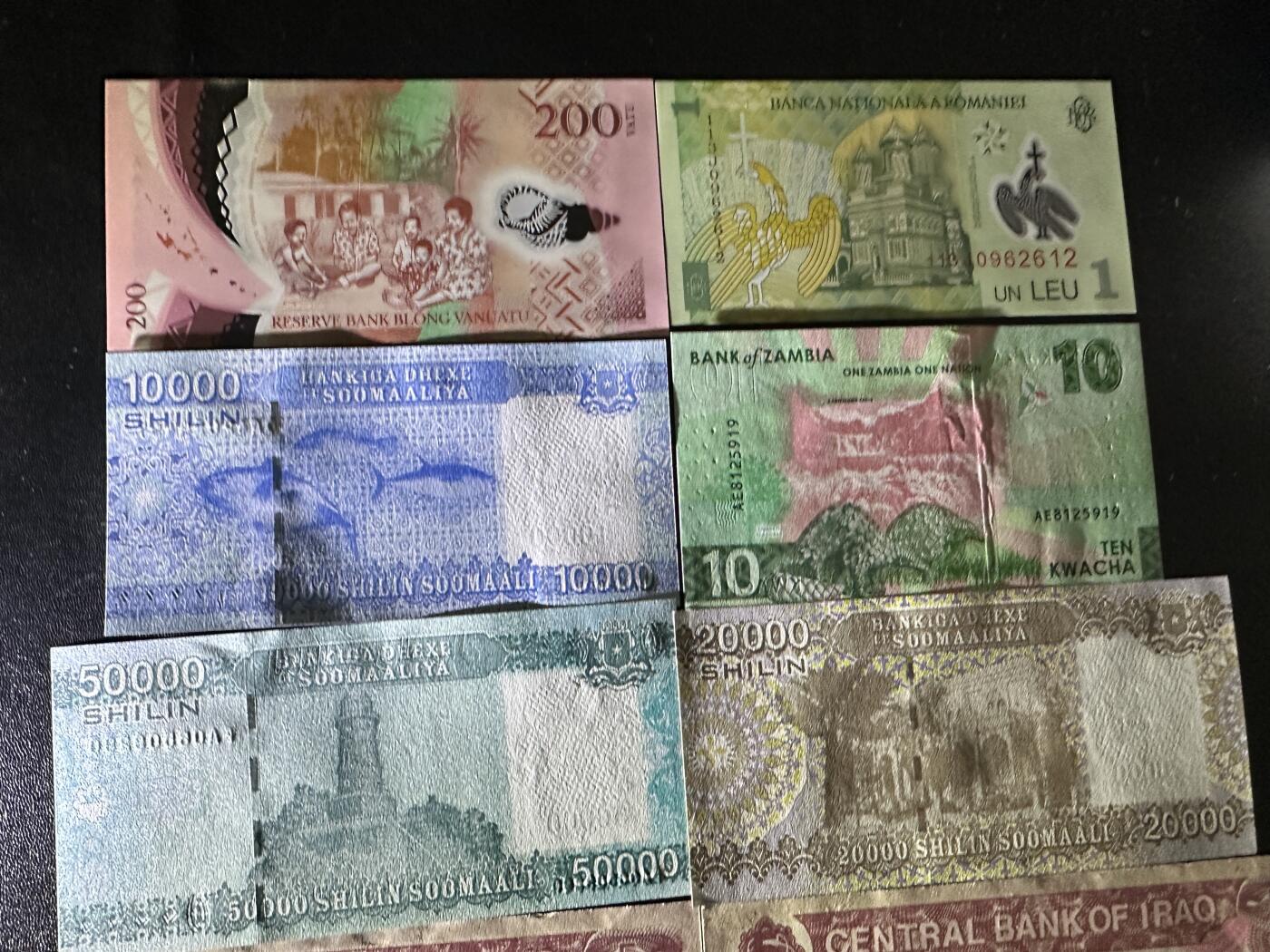 《外钞收藏家》第五百八十七期（精选场）（本平台长期征集拍品、欢迎藏友们联系合作） 瓦努图、罗马尼亚、赞比亚、索马里亚6张全新+伊拉克2张UNC-