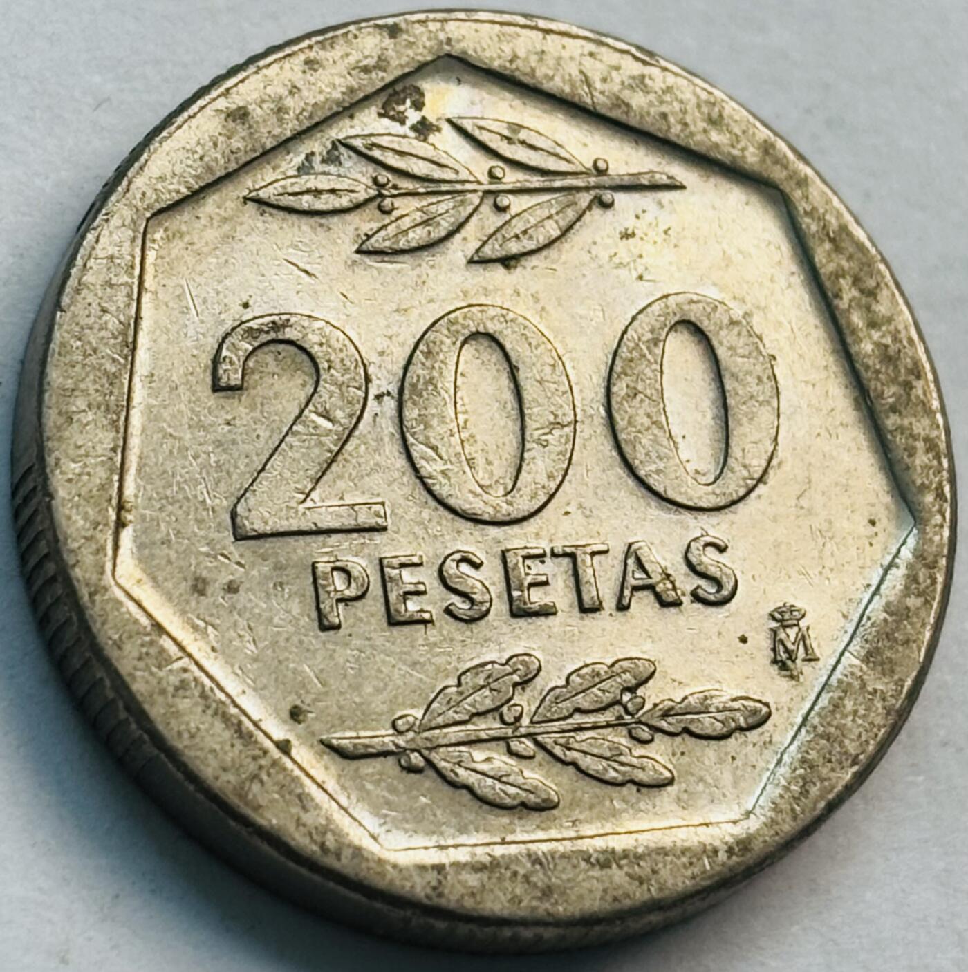 文馨钱币收藏第 282 场，【 长期接收代拍品】，加拿大老铜代用币，银币，德三系列场 少见 1986 年西班牙 200 比塞塔 胡安卡洛斯一世肖像第一版首发年，只发行三年