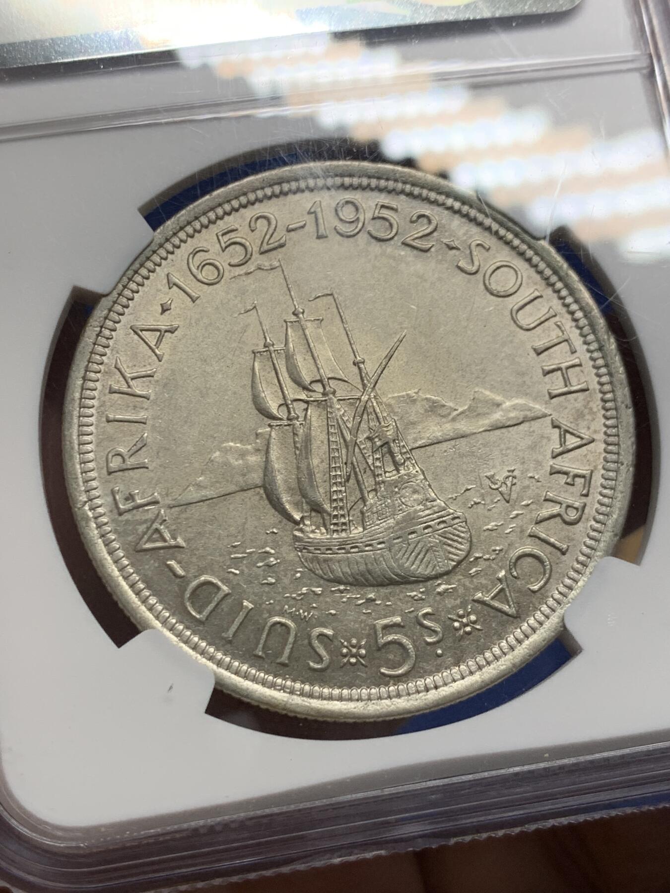 《竞宝斋》第441场 周日，周一，2场连拍 （全场包邮） NGC AU55 南非1952年乔六发现开普敦建城300周年5先令大银币，高点俱在