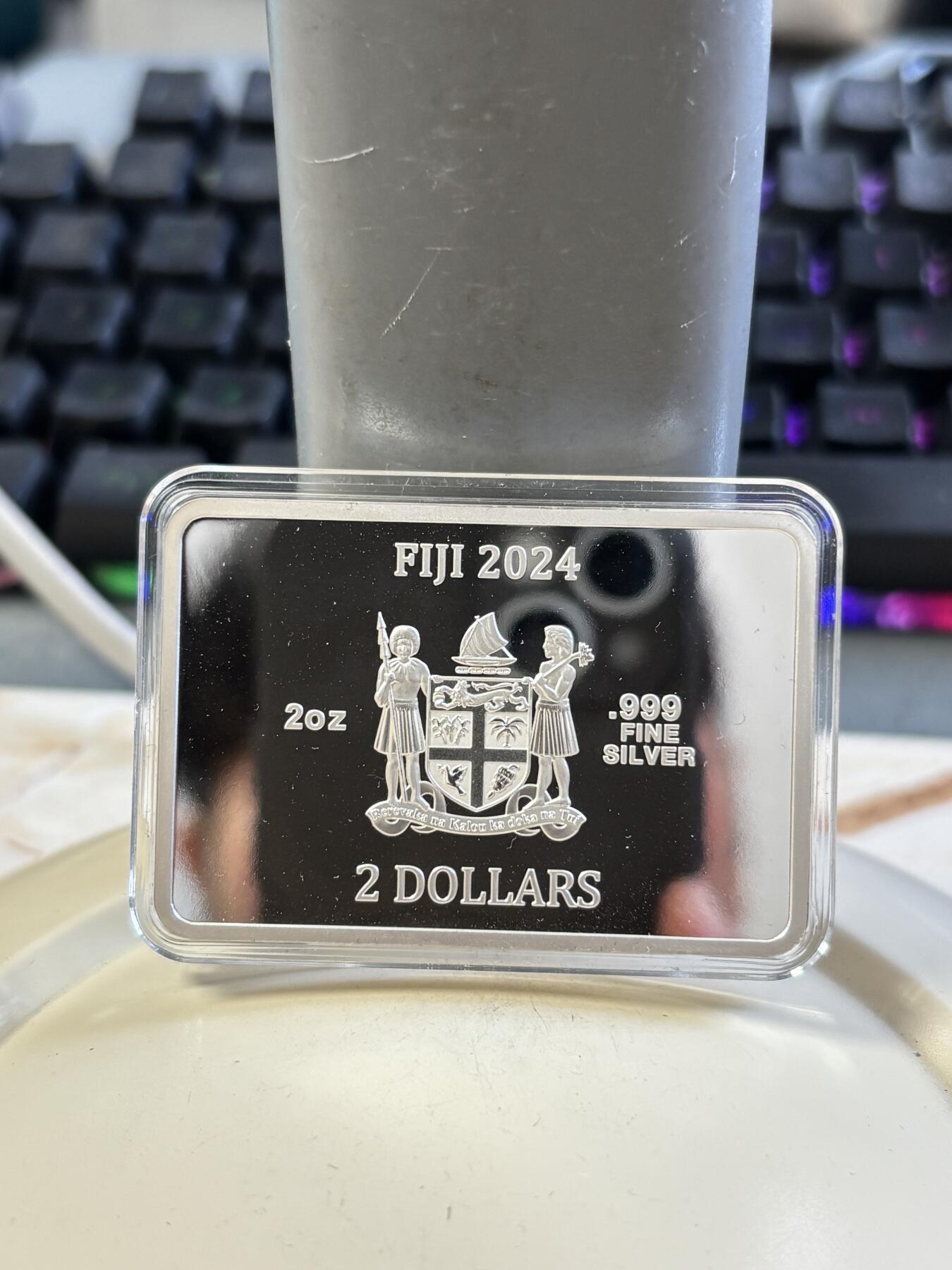 第183期拍卖 斐济2024年星空下的蒙娜丽莎2盎司矩形纪念彩银币，999银，发行300枚，