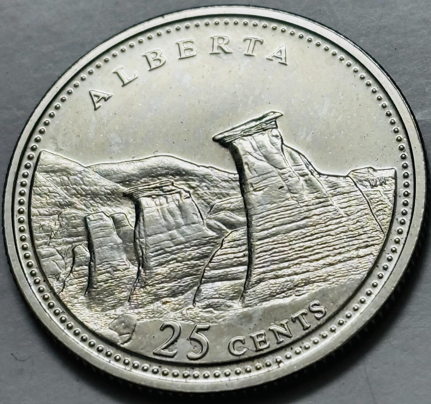 文馨钱币收藏第 282 场，【 长期接收代拍品】，加拿大老铜代用币，银币，德三系列场 少见全新未流通 1992 年加拿大 阿尔伯塔省联邦成立125 周年 25 分纪念币