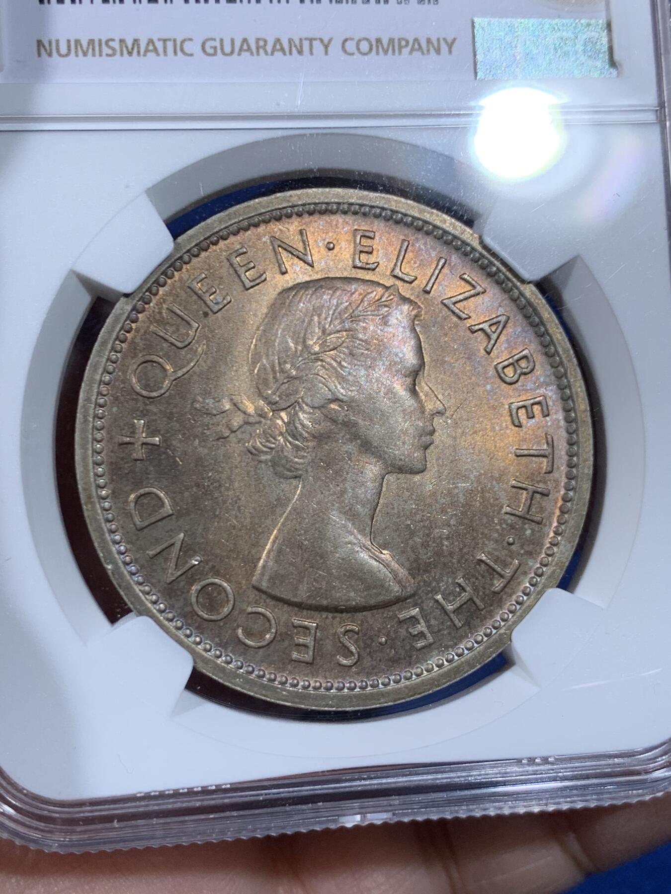 《竞宝斋》第441场 周日，周一，2场连拍 （全场包邮） NGC MS64 南罗德西亚1953年1克朗纪念大银币，双面金黄包浆，分数尚佳，难得的品种分数包浆都优秀的一枚币