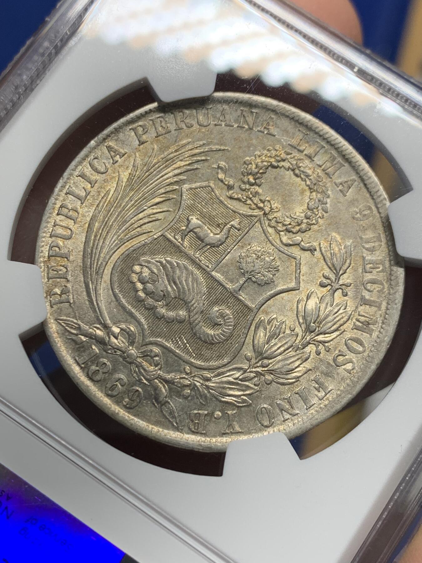 《竞宝斋》第441场 周日，周一，2场连拍 （全场包邮） NGC AU58 秘鲁1869年1索尔银币，阿拉伯1版，早期年份高银版本