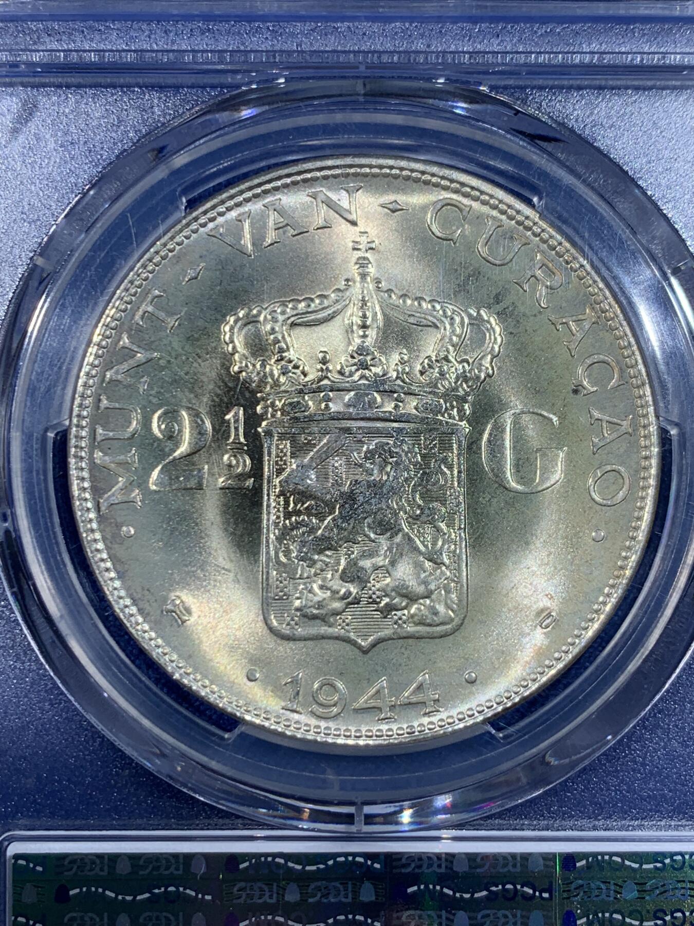 《竞宝斋》第441场 周日，周一，2场连拍 （全场包邮） PCGS MS65 荷属库拉索1944年2.5盾大银币 背面卡脚有损，密封正常