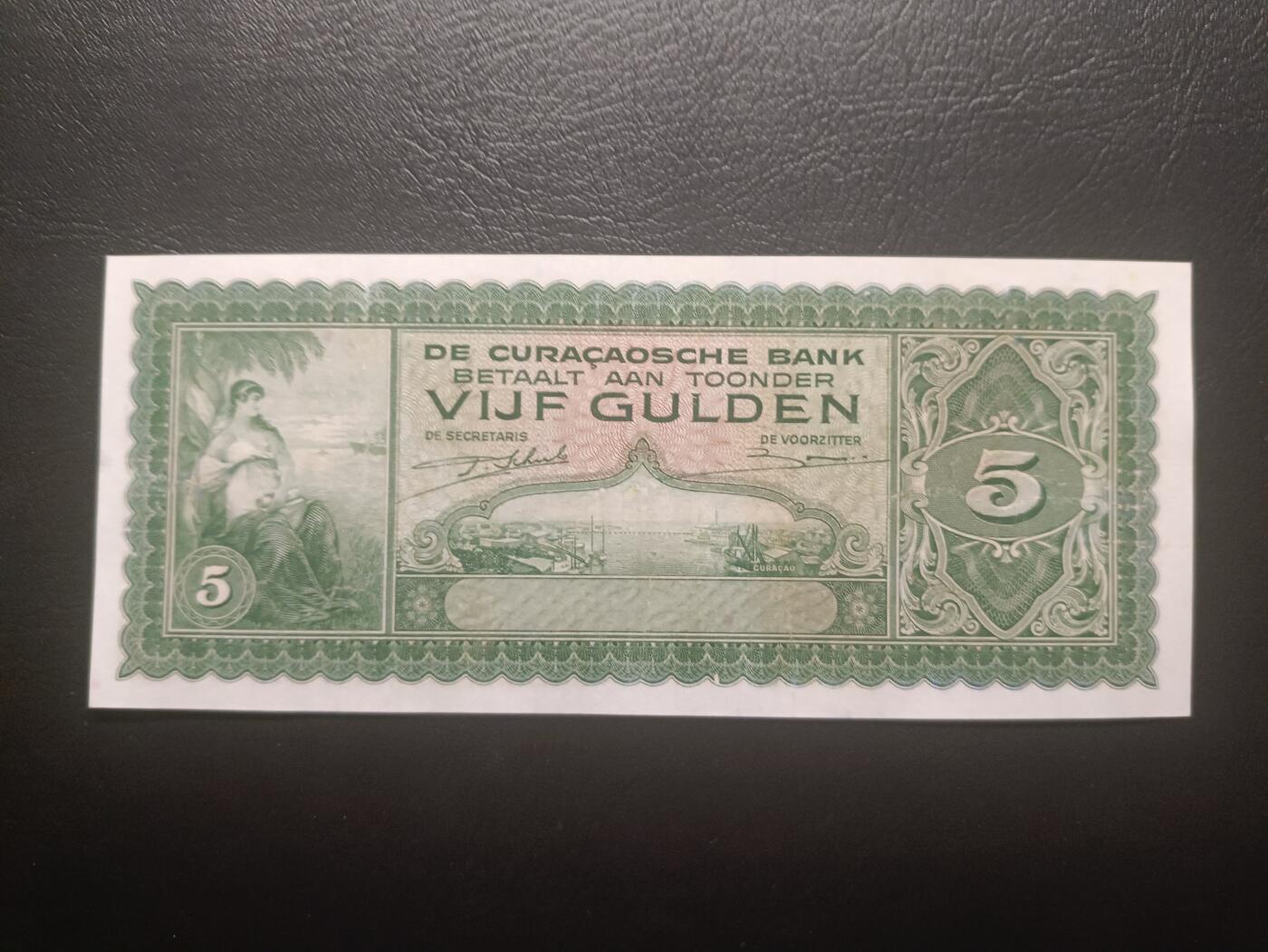 2025十一月第六期，总第204期 荷属库拉索1943年5盾流通好品XF，稀有荷属殖民地中高面值品种，库拉索港俯瞰图和女性形象