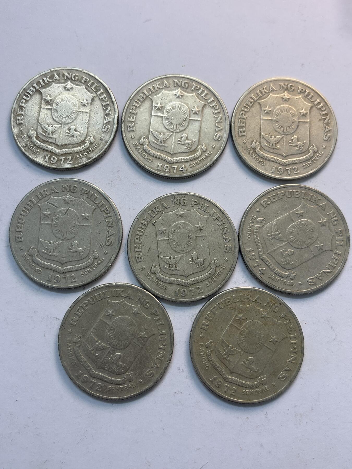 文馨钱币收藏第 282 场，【 长期接收代拍品】，加拿大老铜代用币，银币，德三系列场 菲律宾大 1 比索 8 枚