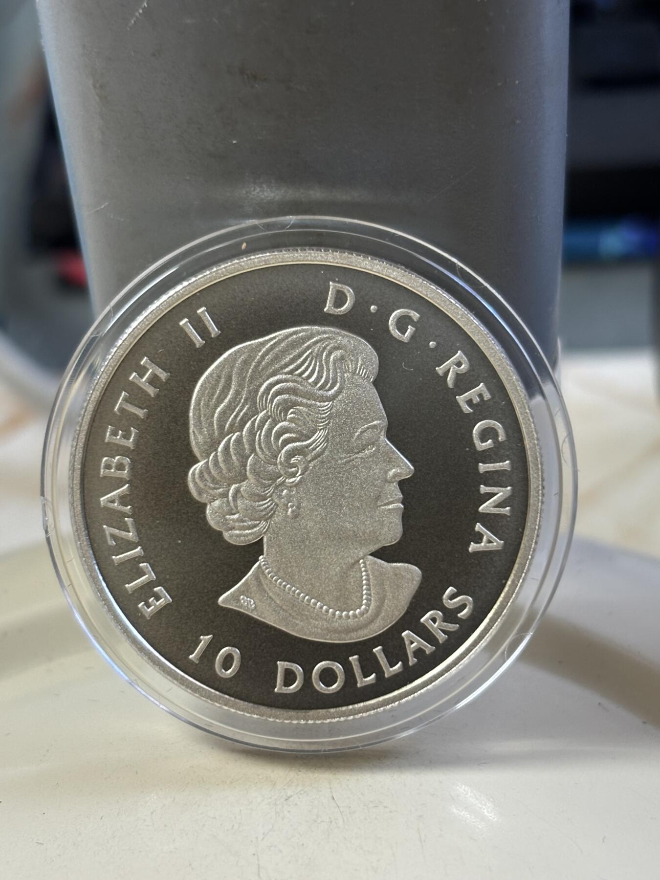 第183期拍卖 加拿大2017飞机漂浮在麦肯齐河150周年纪念彩银币，9999银，15.87克