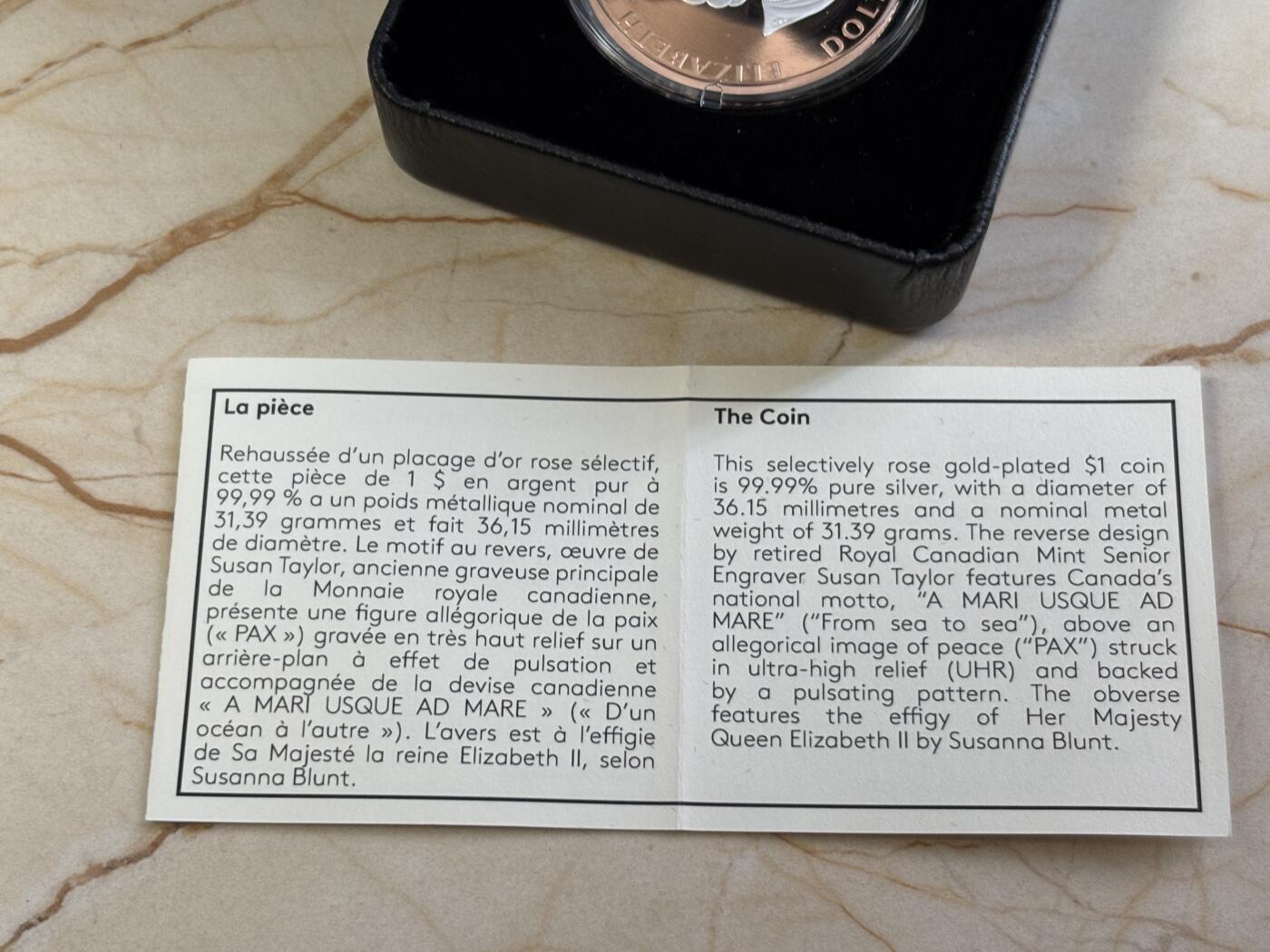 第183期拍卖 加拿大2023年和平女神局部镀玫瑰金精制纪念银币，9999银，31.39克，发行6000枚，塑料盒有破