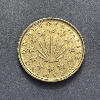 回流1123 - 西班牙1993年100比塞塔“圣地亚哥之路”纪念币 圣地亚哥之路是欧洲著名的朝圣路线，终点为西班牙加利西亚的圣地亚哥-德孔波斯特拉大教堂，是基督教三大朝圣路线之一。